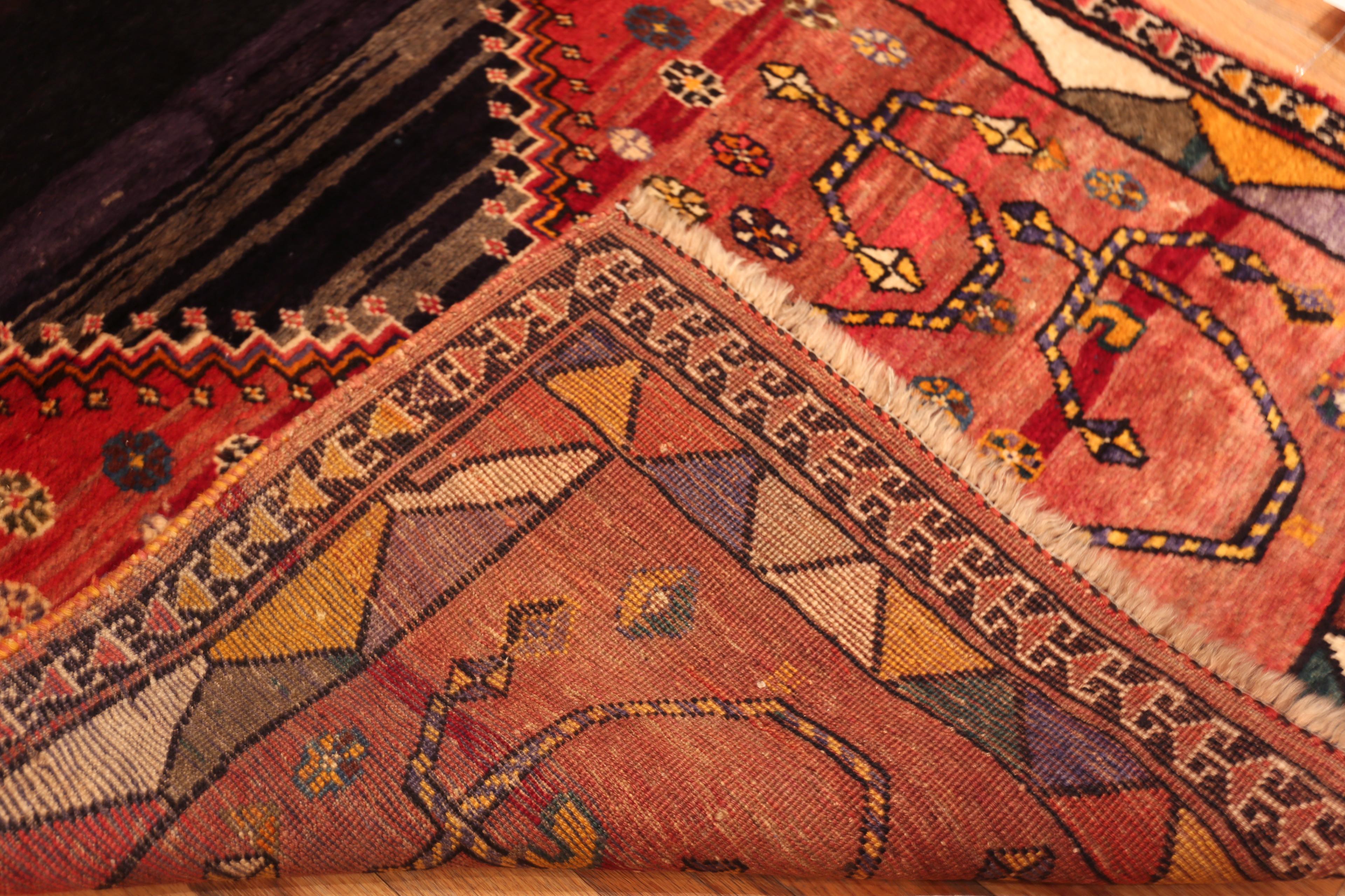 Persian Gabbeh Rug with Abstract Tribal Diamond Medallion and Colorful Rosettes, Origin: Persia, Circa Date: Vintage