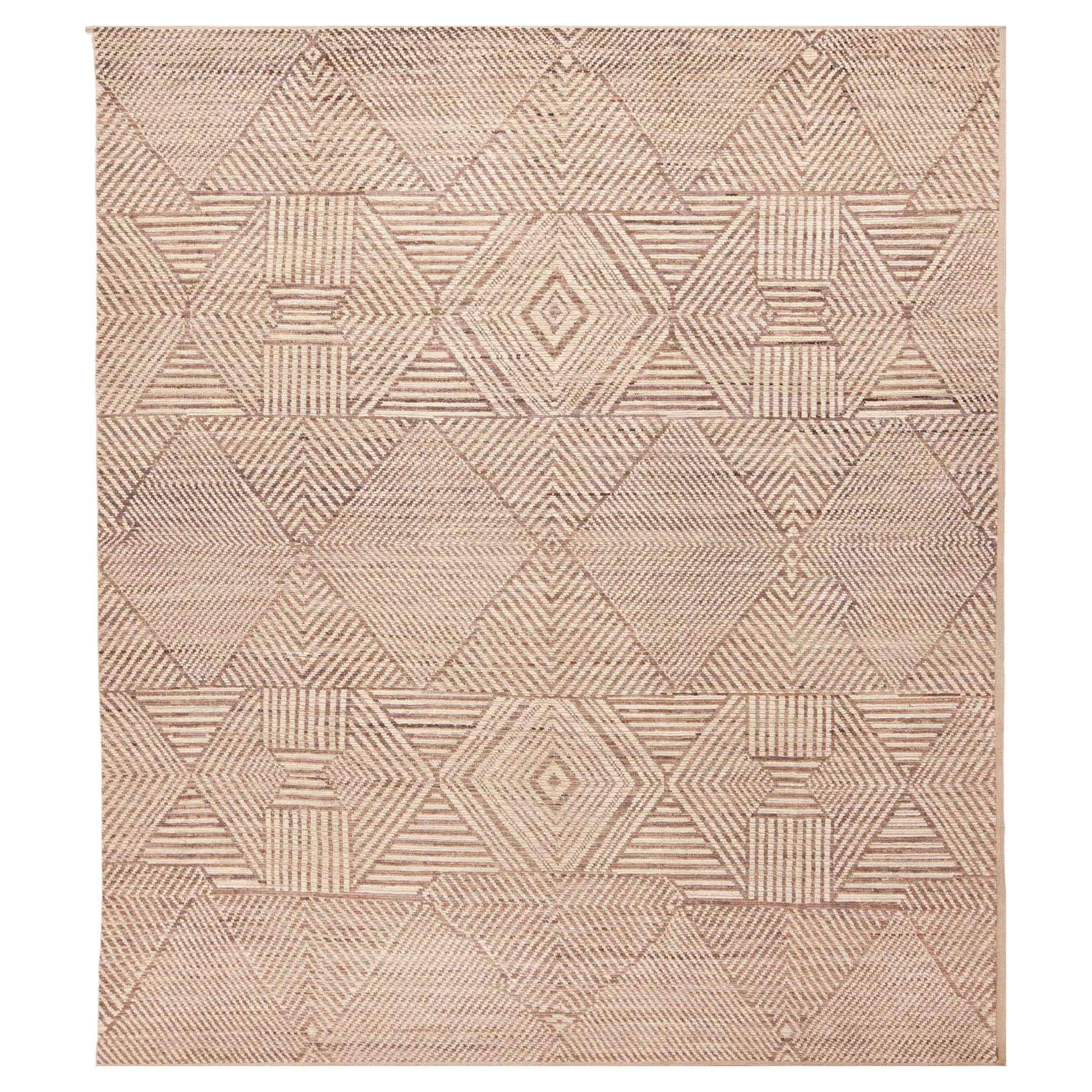 Tapis de la collection Nazmiyal à motifs tribaux modernes de couleurs neutres 9' x 10'