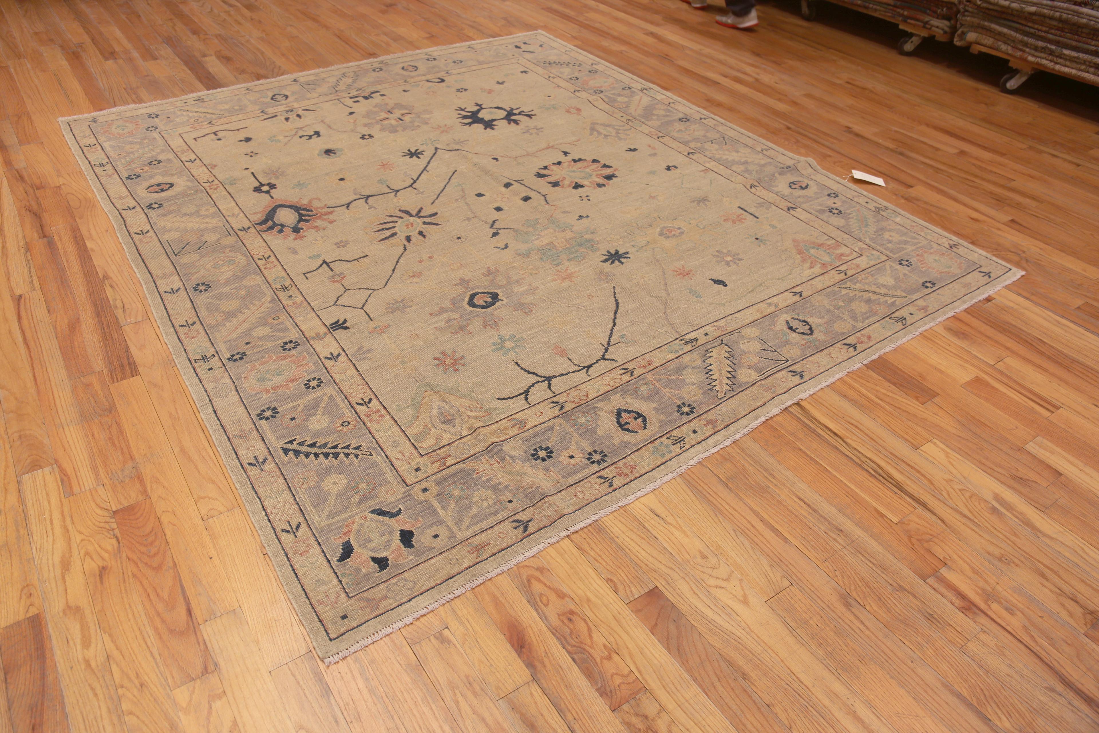 Beautiful and Decorative Soft Pastel Color Tribal Geometric Floral Design Room Size Modern Turkish Oushak Design Area Rug, Country of Origin: Central Asia, Circa Date: Modern Rug 