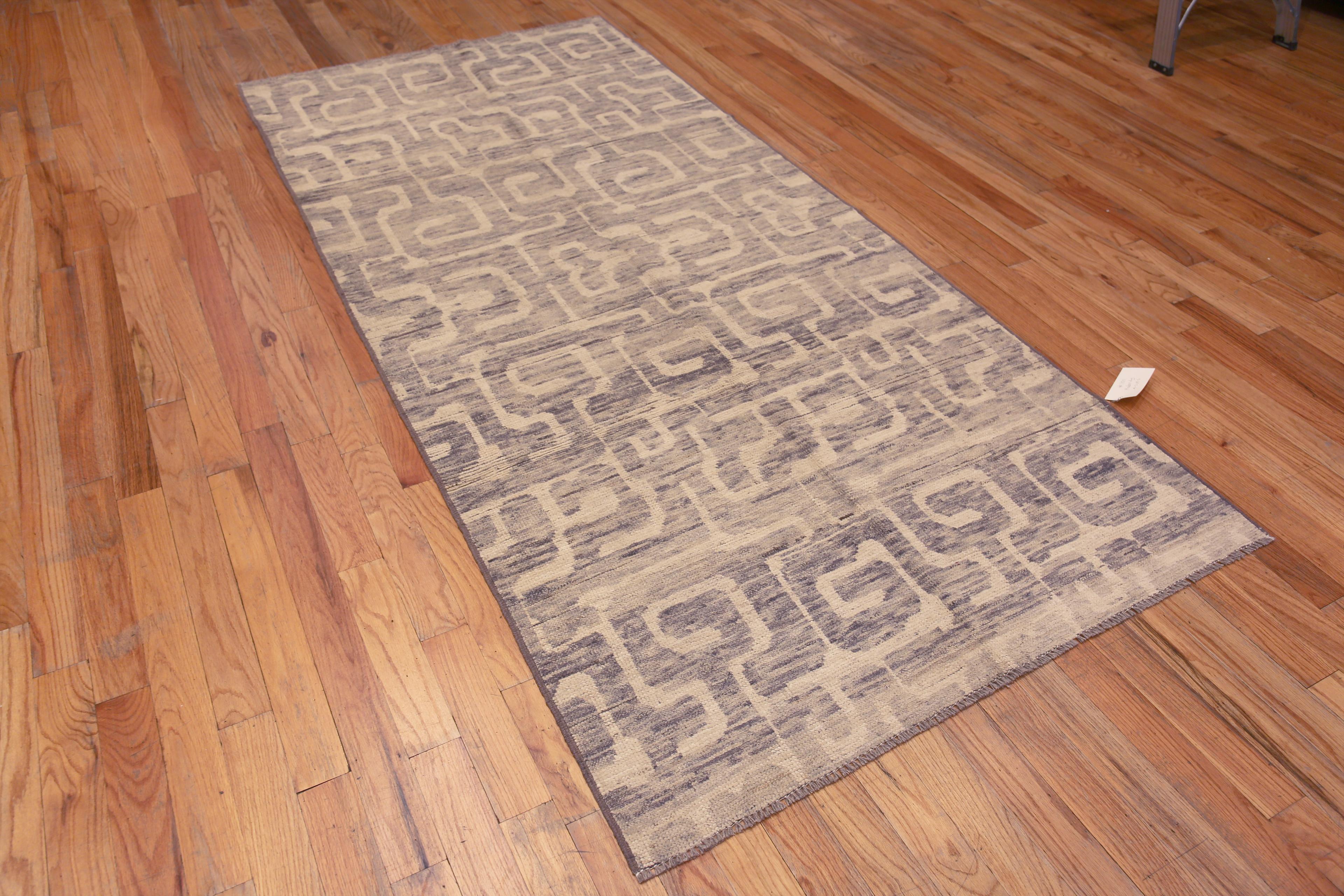 A Beautiful Neutral Color Tribal Geometric Design Long and Narrow Gallery Size Modern Area Rug, Country Of Origin: Central Asia, Circa Date: Modern Rug 