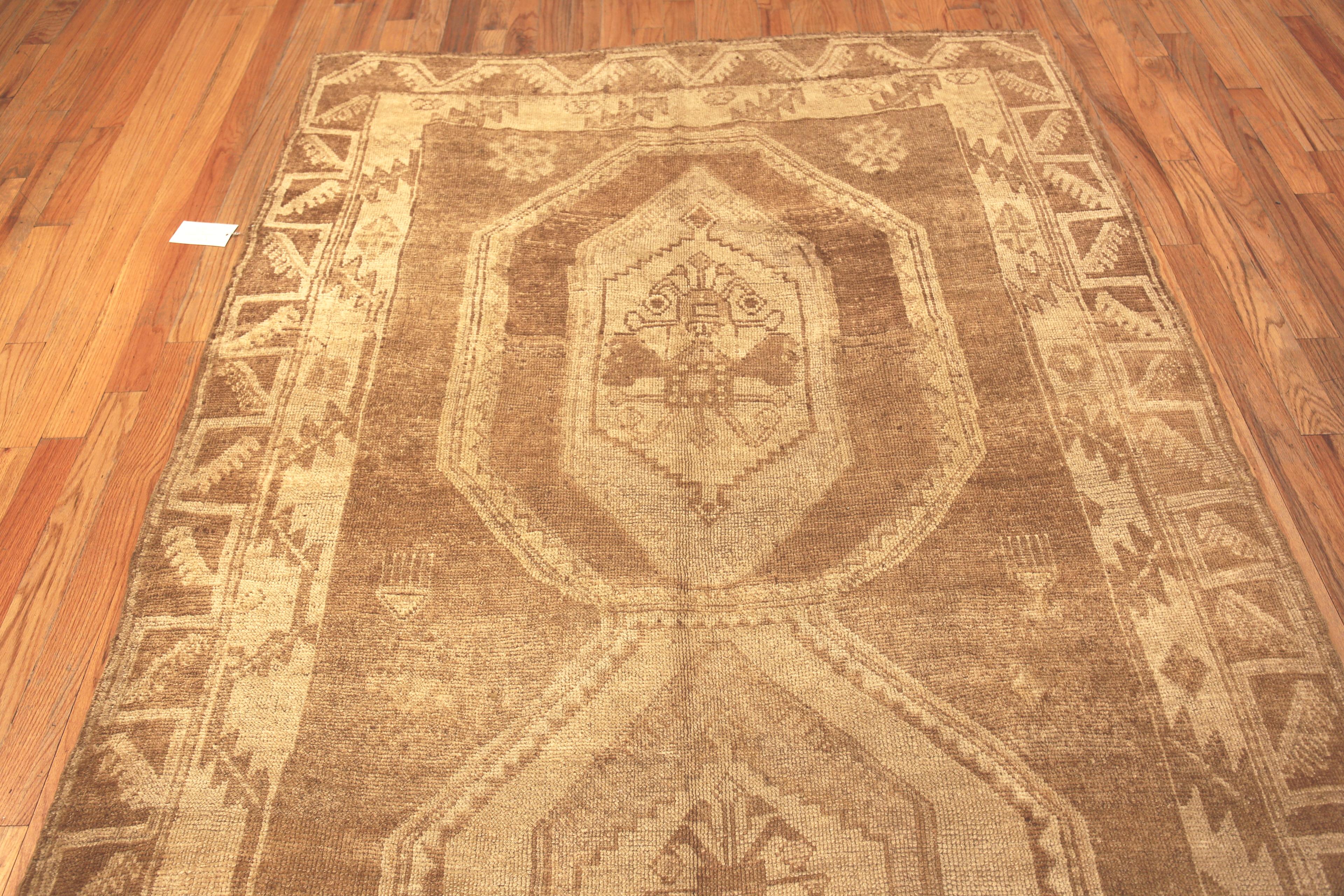 Beautiful Geometric Decorative Tribal Vintage Turkish Kars Rug, Origin: Turkey, Circa date: Vintage – Rugs from Kars are some of the most delightful in the world. They often feature warm common neutral tones in a range of browns. They also feature