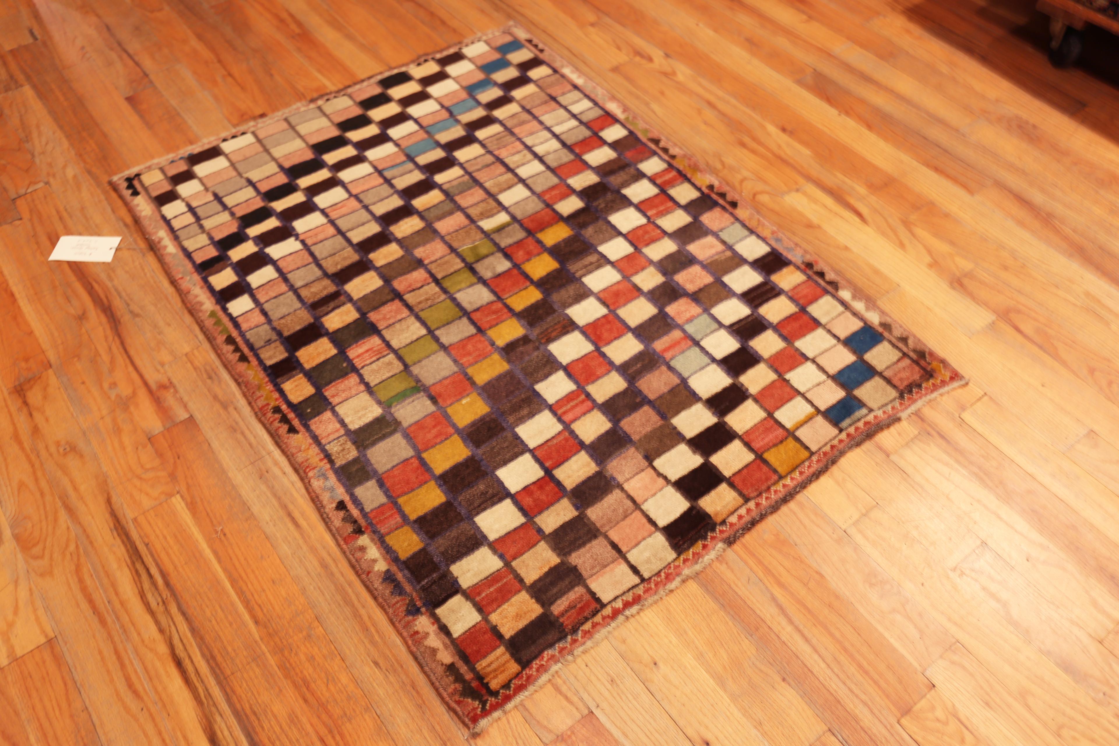 Vintage Persian Gabbeh Rug with Vibrant Checkerboard Pattern and Earthy Modernist Aesthetic, Country of Origin: Persia, Circa Date: Vintage