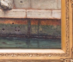 A lady waiting for a gondolier at the entrance to the Palazzo Rizzini, Venice