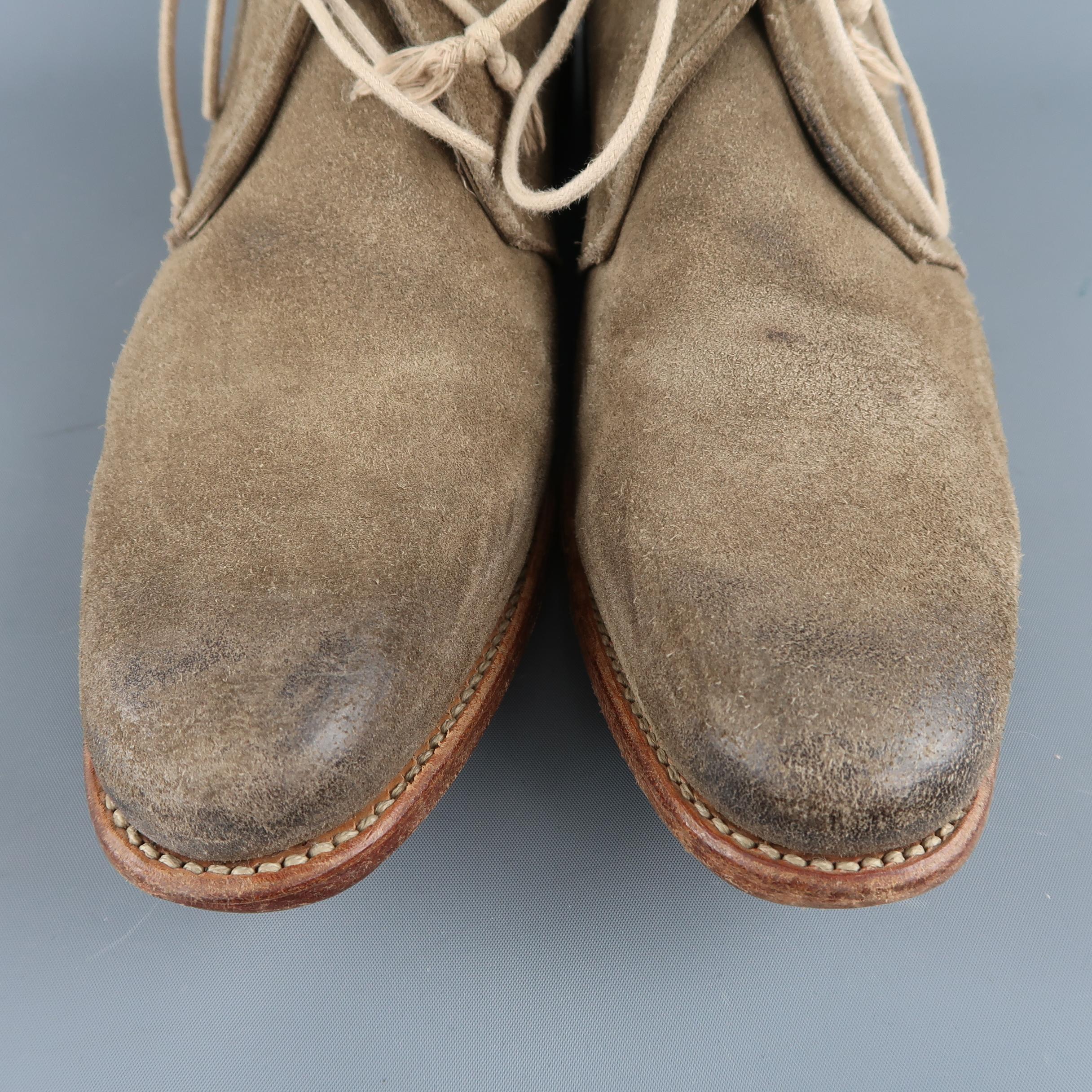 N.D.C. chukka ankle boots come in distressed beige suede with a rounded pointed toe, ace up front, and tan sole. Made in EU.
 
Very Good Pre-Owned Condition.
Marked: IT 43
 
Measurements:
 
Length: 13 in.
Width: 4 in.
Height: 4 in.