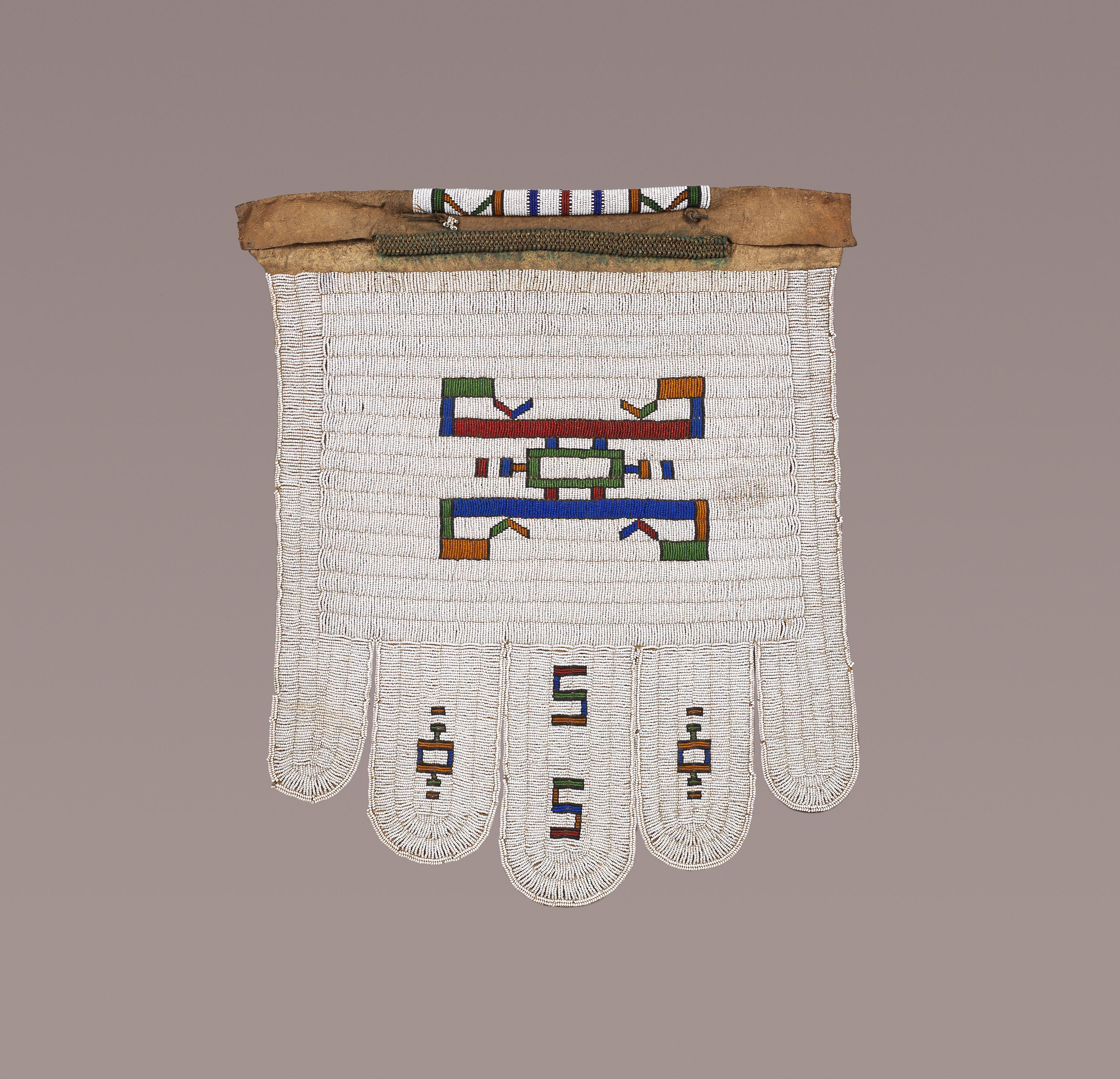 Married Woman’s Beaded Apron Jocolo 
Ndebele People, South Africa
Circa 1940-1950
Glass beads on leather (goatskin ?), handcart brass beads
In excellent condition