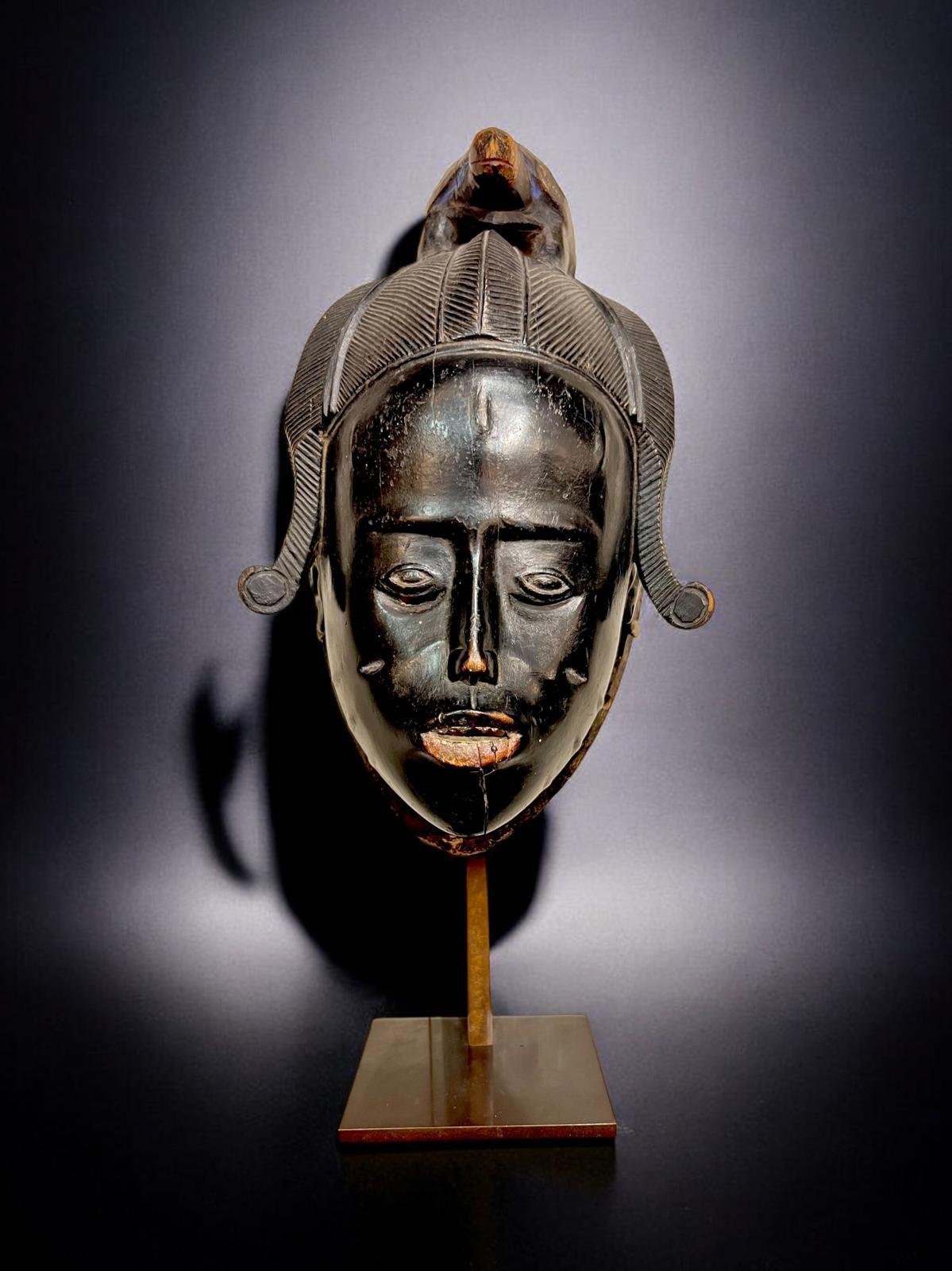 Tribal Ndoma Baule Portrait Mask, Ivory Coast, Wood, lacquered patina, Circa 1930 For Sale