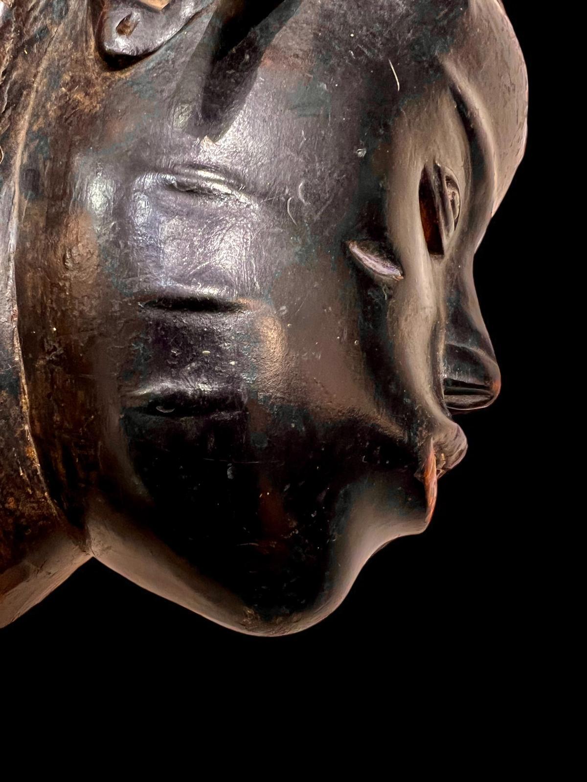 Hand-Carved Ndoma Baule Portrait Mask, Ivory Coast, Wood, lacquered patina, Circa 1930 For Sale
