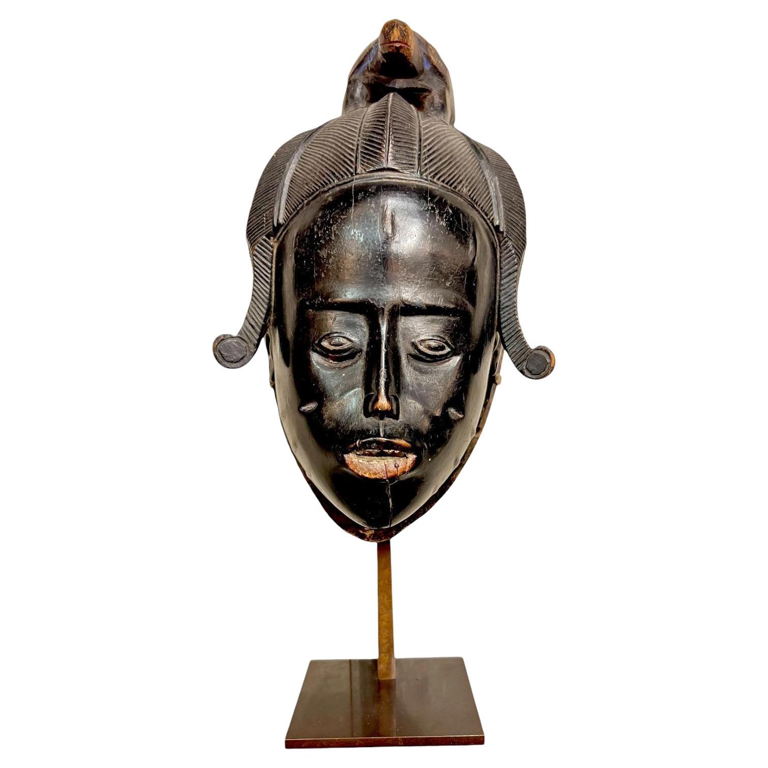 Ndoma Baule Portrait Mask, Ivory Coast, Wood, lacquered patina, Circa 1930 For Sale