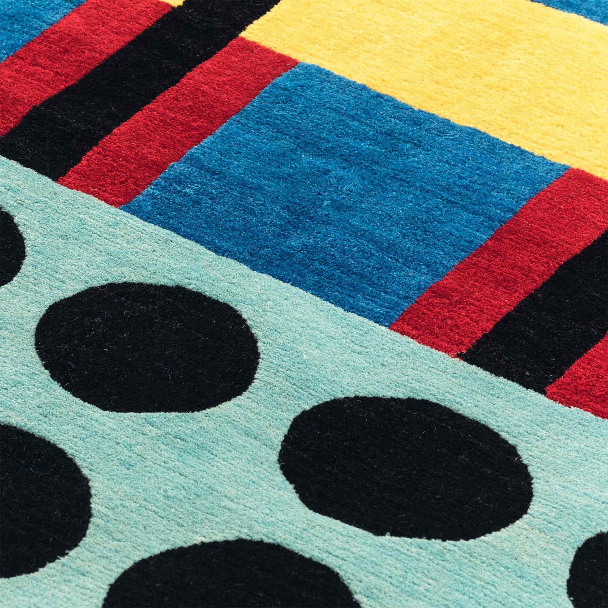 NDP55 woollen carpet by Nathalie Du Pasquier for Post Design collection/Memphis

A woollen carpet handcrafted by different Nepalese artisans. Made in a limited edition of 36 signed, numbered examples.

As the carpet is made by hand, there are