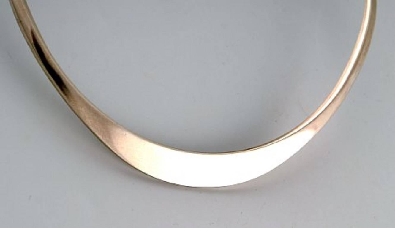 N.E. Von Halskette aus Sterlingsilber. Dänisches Design der 1970er Jahre.
Durchmesser des Halsrings 13,5 bis 14,5 cm.
In perfektem Zustand.
Markiert.