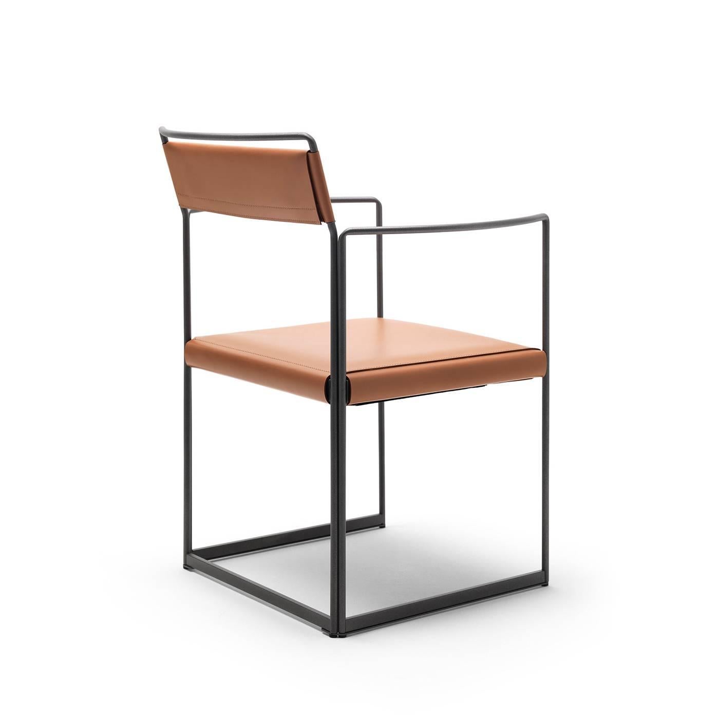 The elegant and contemporary design of this chair by Alberto Colzani (2017) combines form and function while using minimum material. The grey-painted steel rods of the frame outline the shape of the piece with slender lines that make it light and