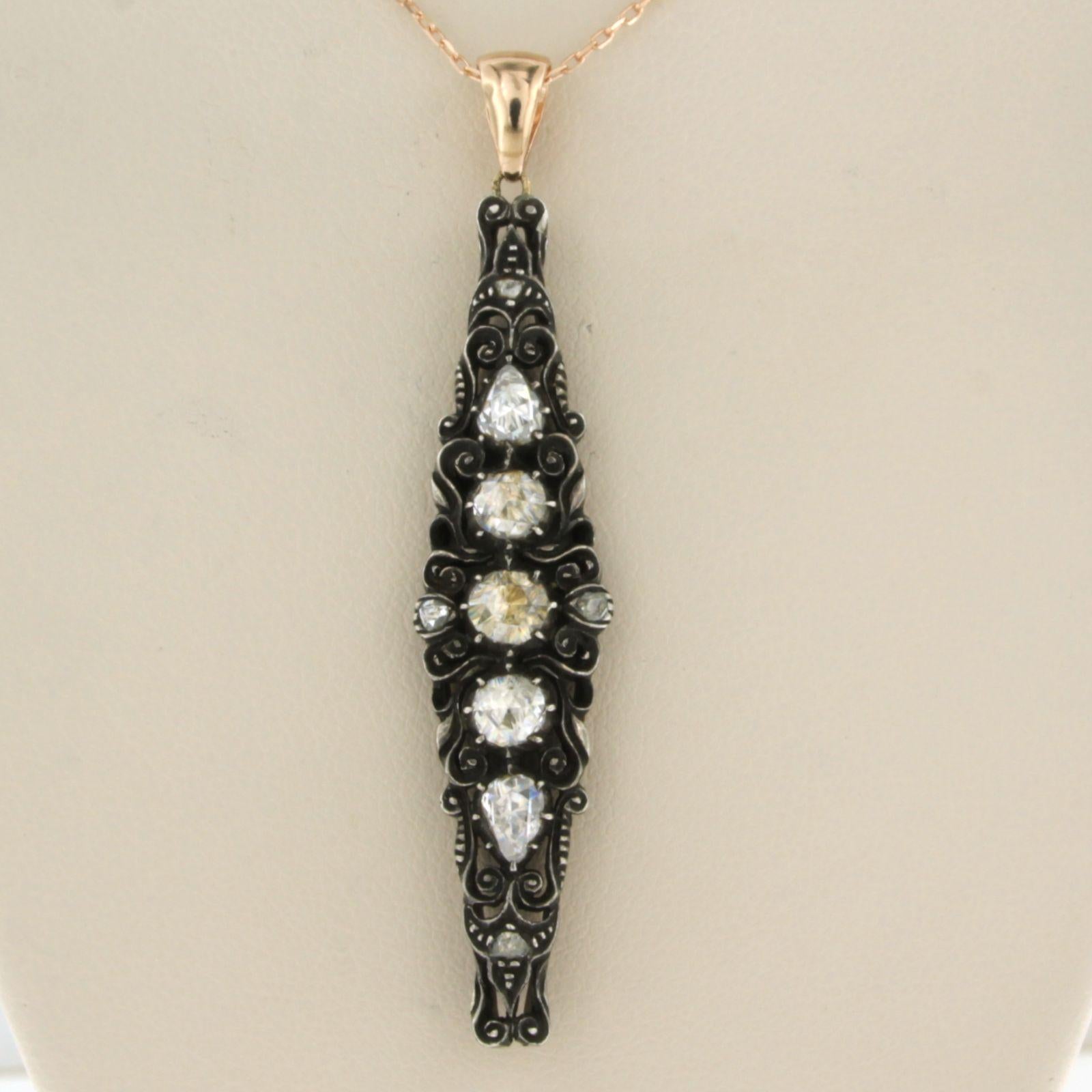 14k pink gold necklace with gold and silver pendant set with rose cut diamonds. 0.80ct - 45cm long

detailed description:

necklace is 45 cm long and 0.9 mm wide

size of the pendant is approximately 5.8 cm by 1.1 cm wide

total weight: 7.0