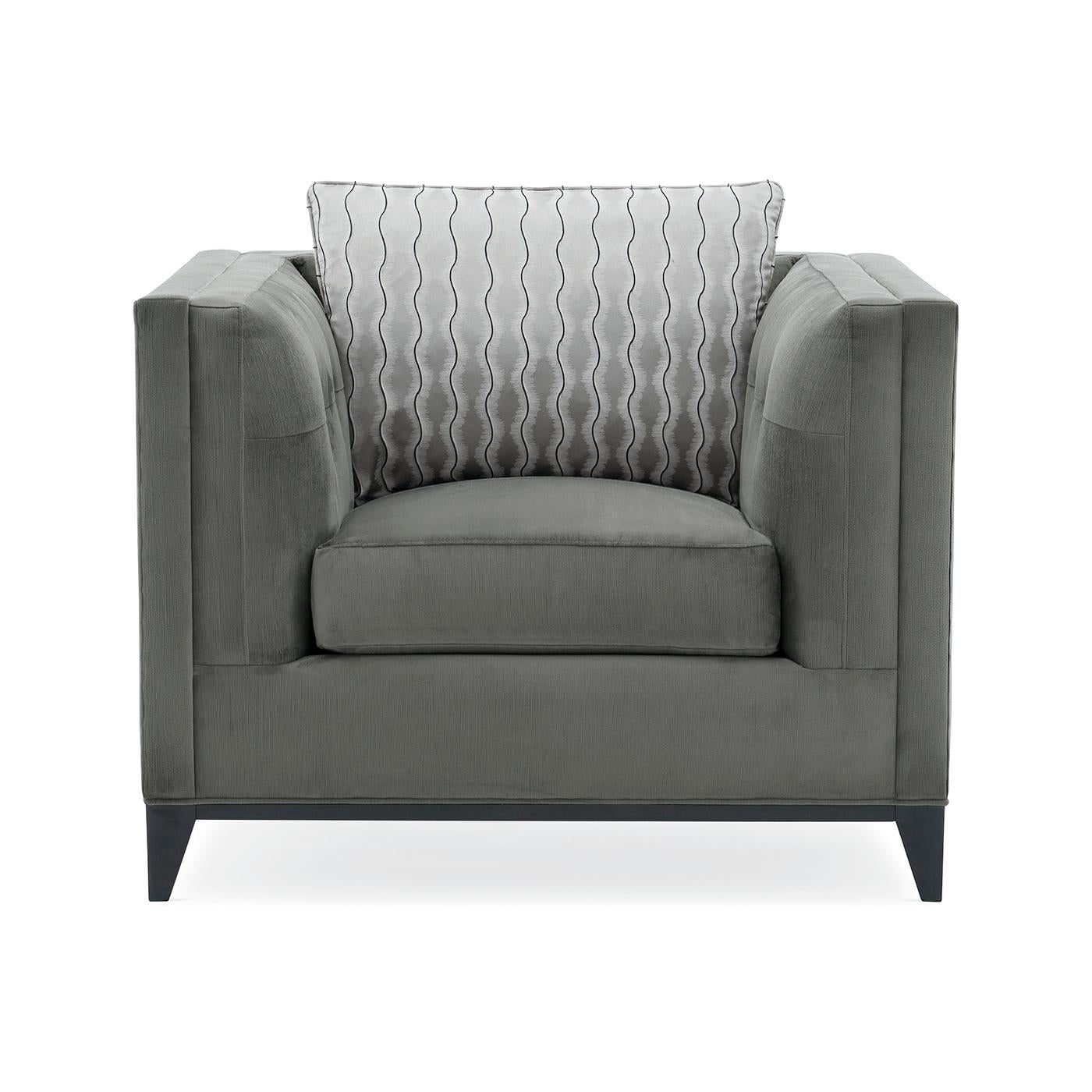 Neah mid century tufted armchair. Nothing's better suited for today's livable luxury than this versatile, modern statement chair. Its button-tufted arms and back provide stunning detail while an accent pillow in a playful platinum stripe adds visual