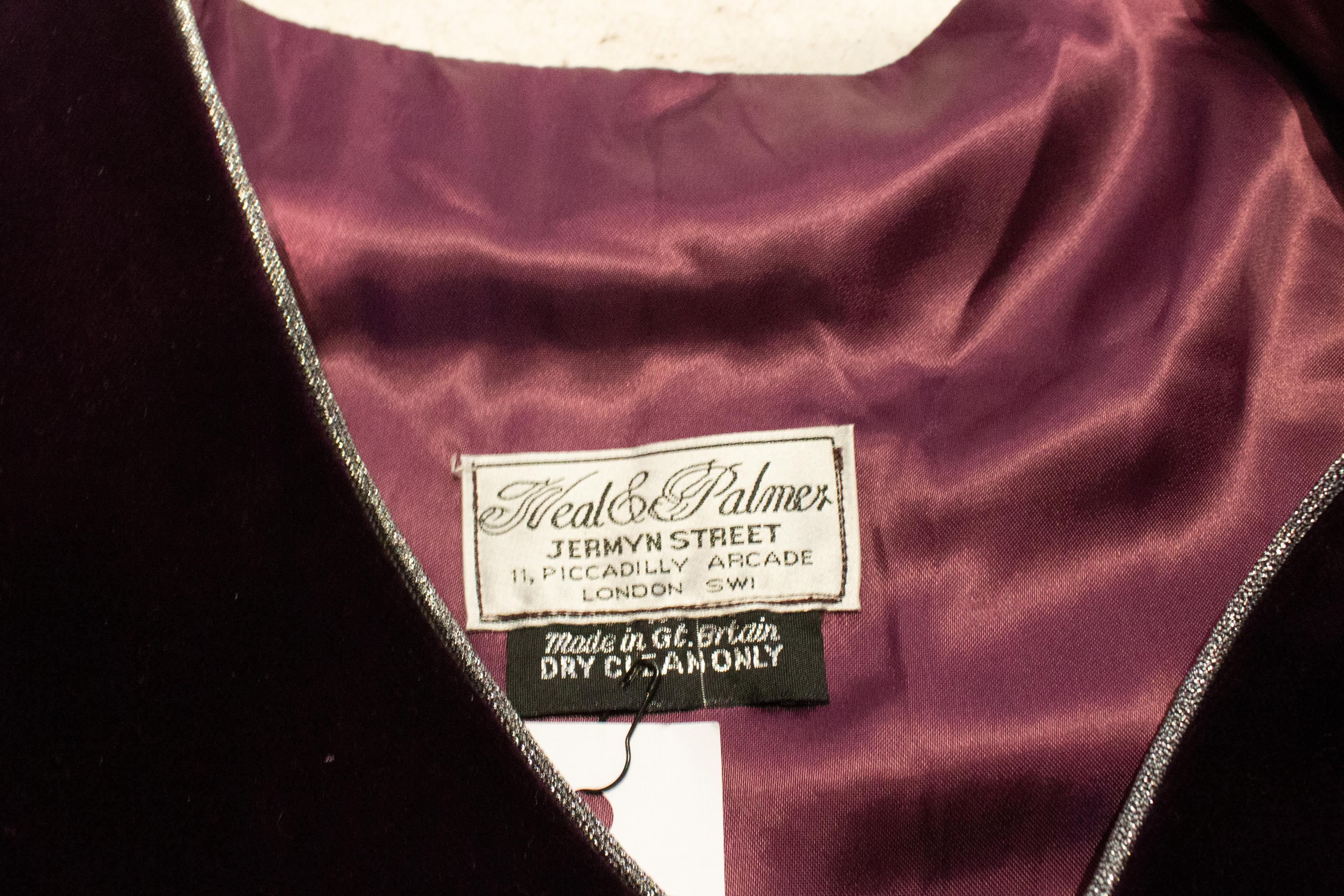 A stunning purple velvet waistcoat by Neal and Palmer. The waistcoat is in a wonderful purple velvet with silver trim and frogging on front. 
Measurements: Bust 37'', length 23''