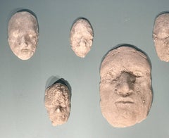 Neal Beckerman Set of 12 Abstract Plaster Relief Sculptures, Heads