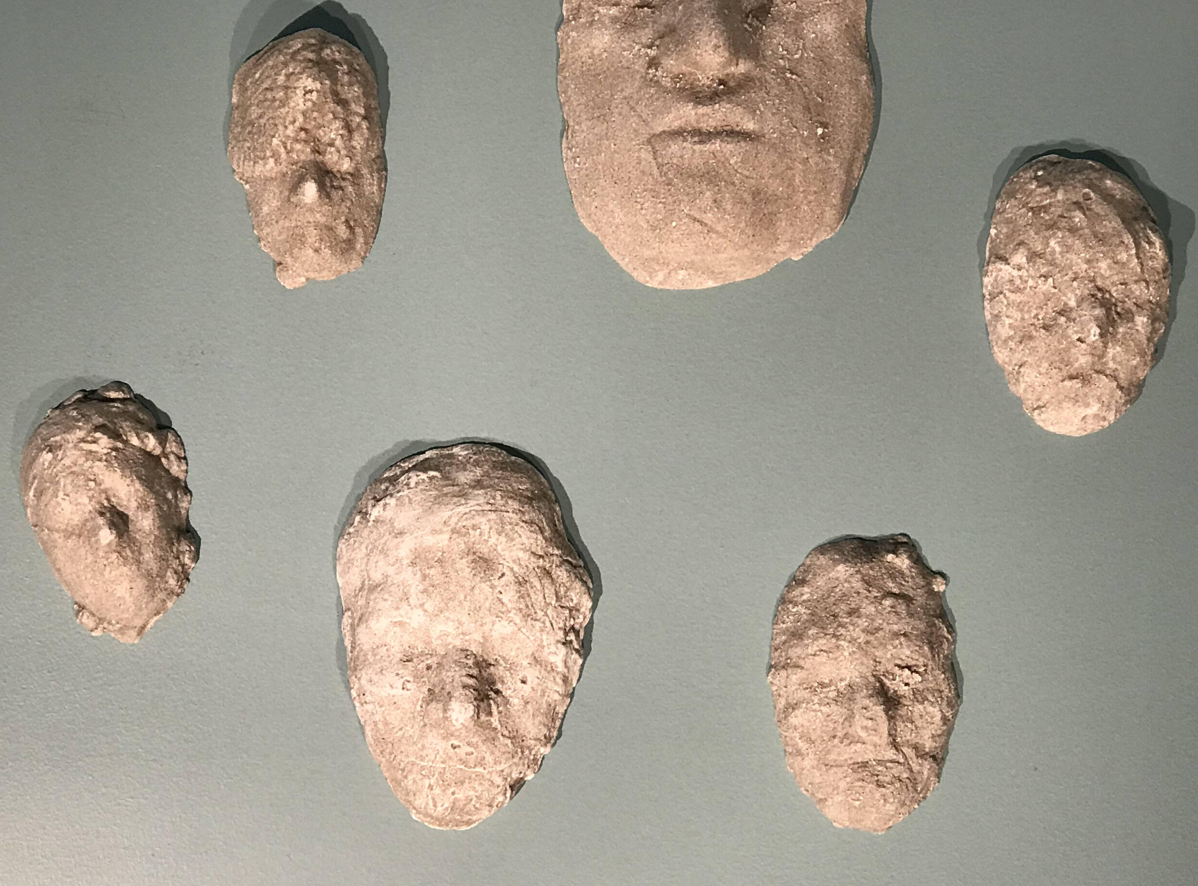 Molded Neal Beckerman Set of 12 Abstract Plaster Relief Sculptures, Heads