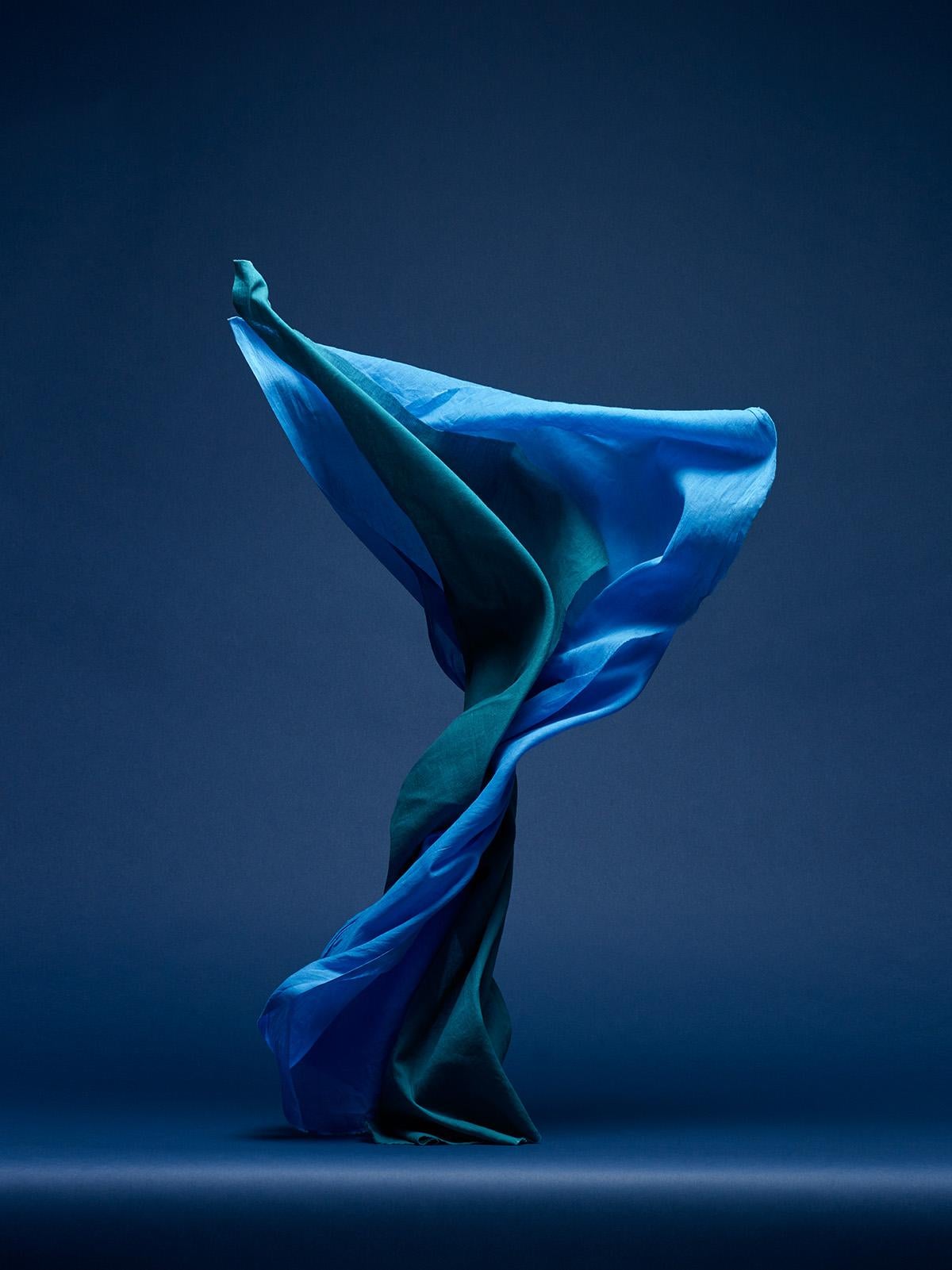 Neal Grundy Color Photograph - Dancing Fabric, Light Blue and Green