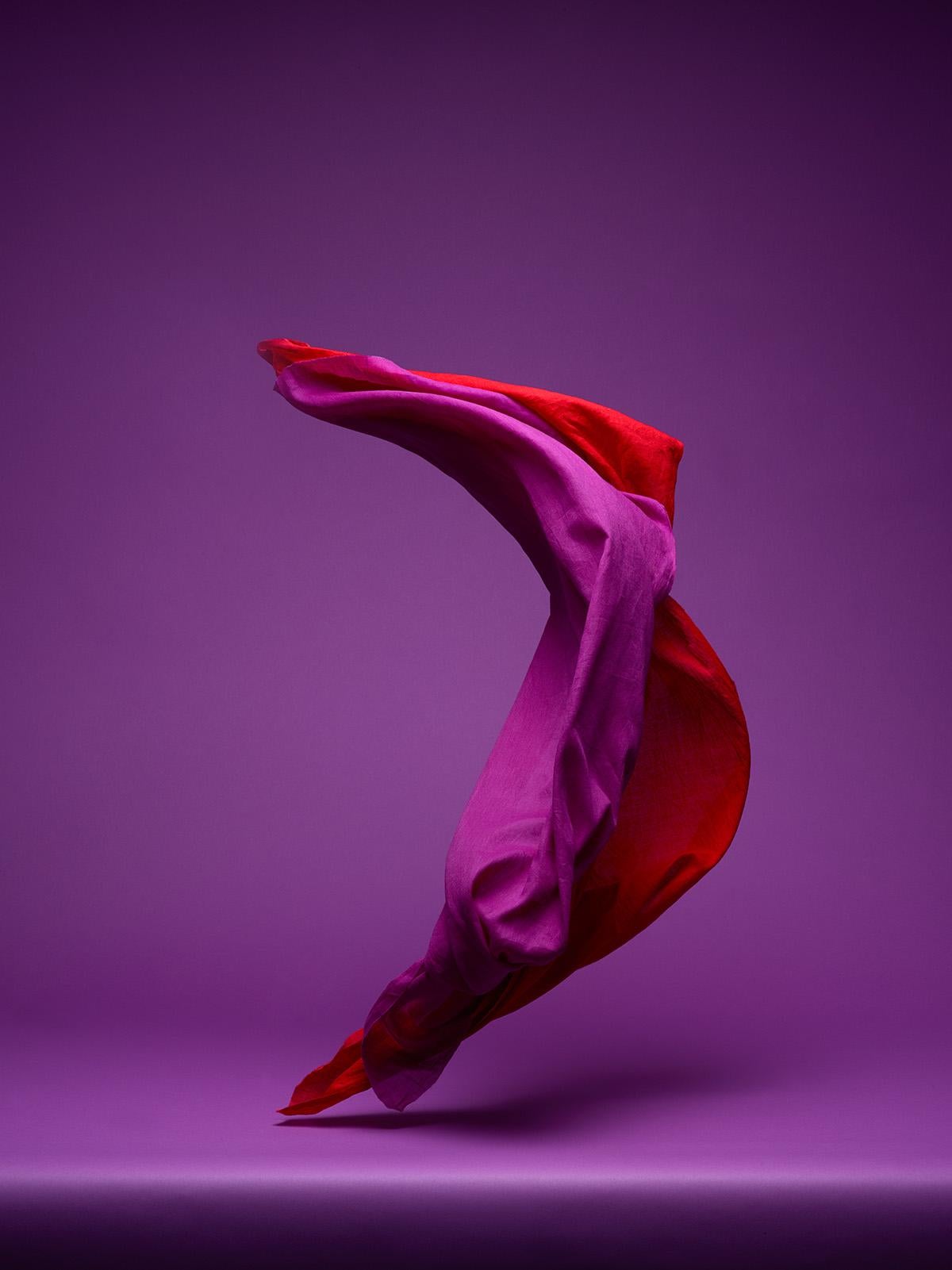 Neal Grundy Color Photograph - Dancing Fabric, Purple and Red