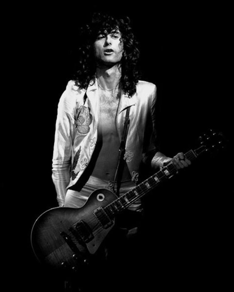 Neal Preston Black and White Photograph – Jimmy Page in Indianapolis, Indiana.  1977