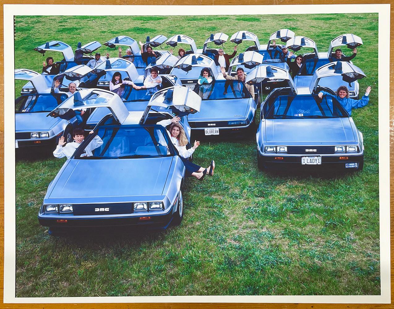 Delorean Club - Ritratto di gruppo a colori, Auto d'epoca, Sci-Fi - Photograph Contemporaneo di Neal Slavin