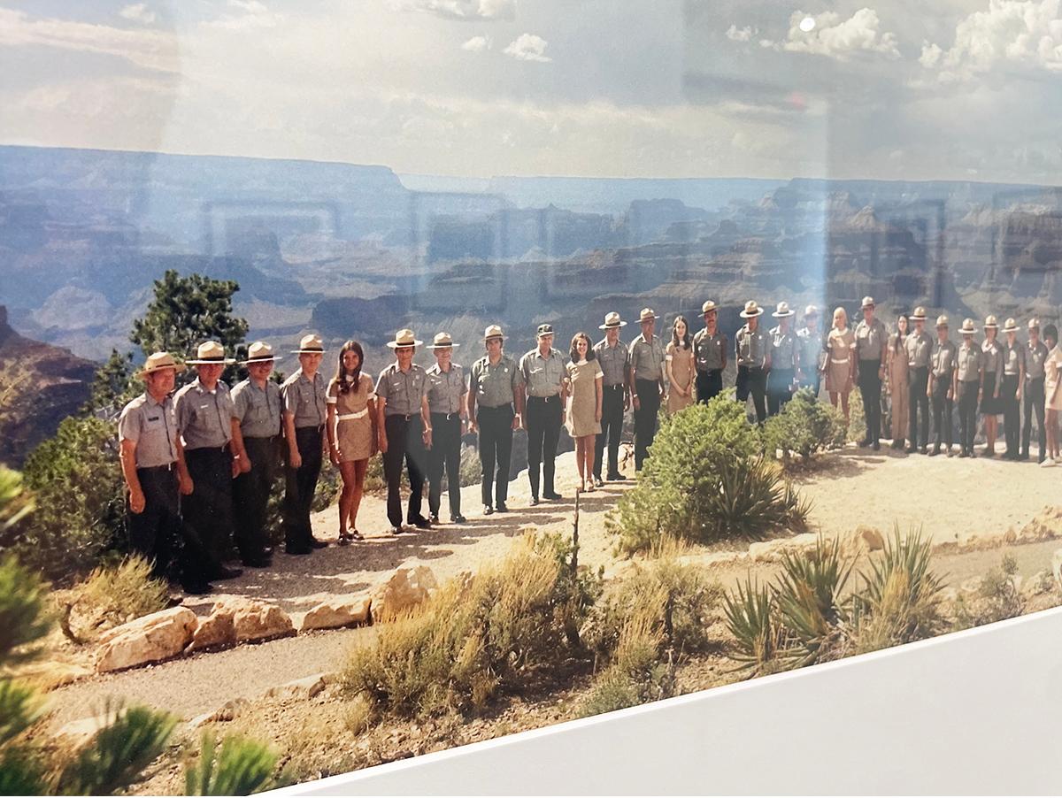 Park Service: Grand Canyon by Neal Slavin is a color group portrait of the park rangers working at Grand Canyon National Park. 

Digital C-Print
Paper size: 17 x 17 in.
Image size: 16 x 16 in.
Signed, titled and dated.
From Slavin's series, When Two