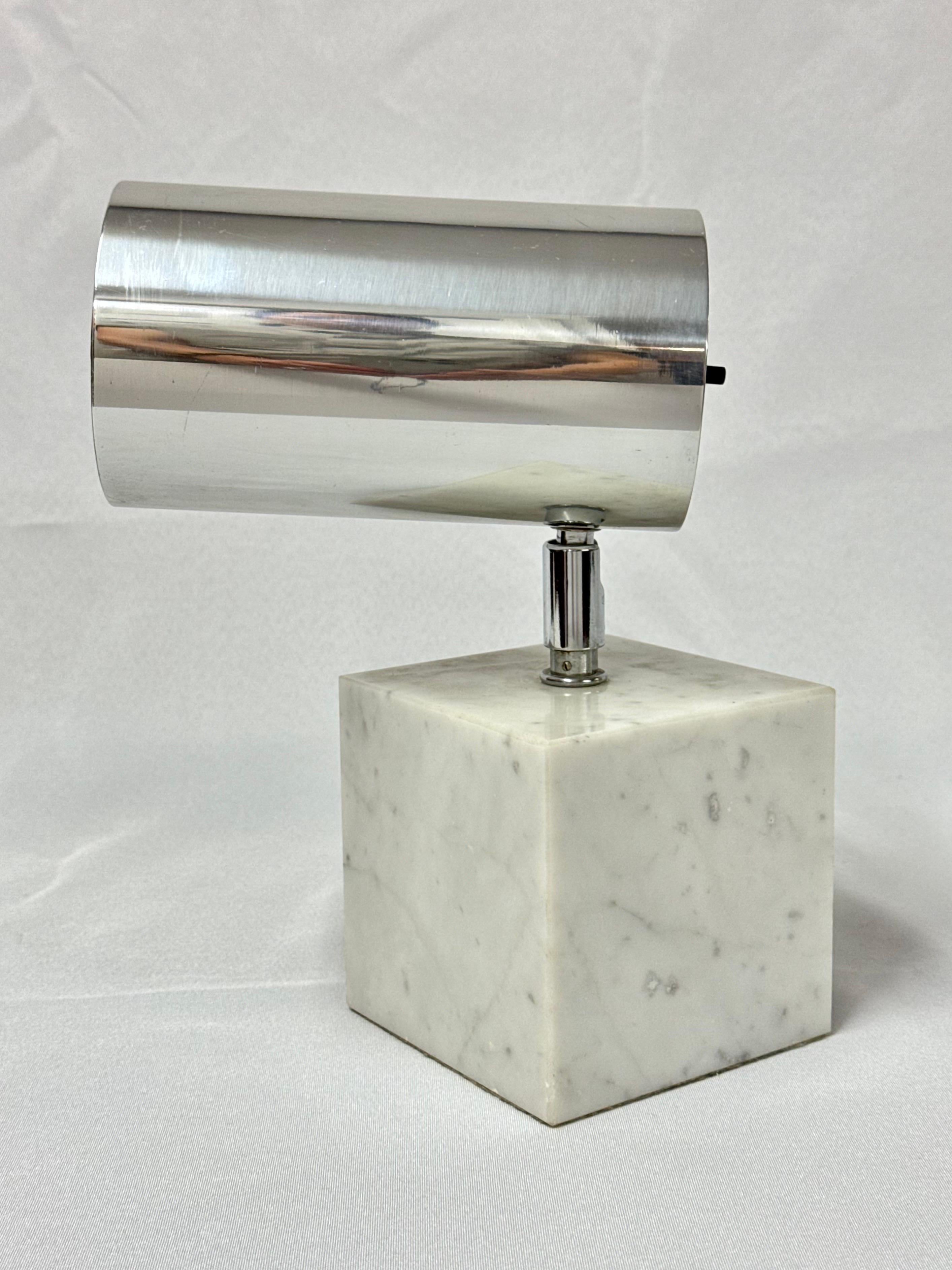 Neal Small for Koch & Lowy Chrome and Marble Table Lamp. Perfect mid century modern table lamp. Cylindrical Chrome spotlight design with black interior and an Italian Carrera marble square block base.  Swivel neck which allows you to aim it where