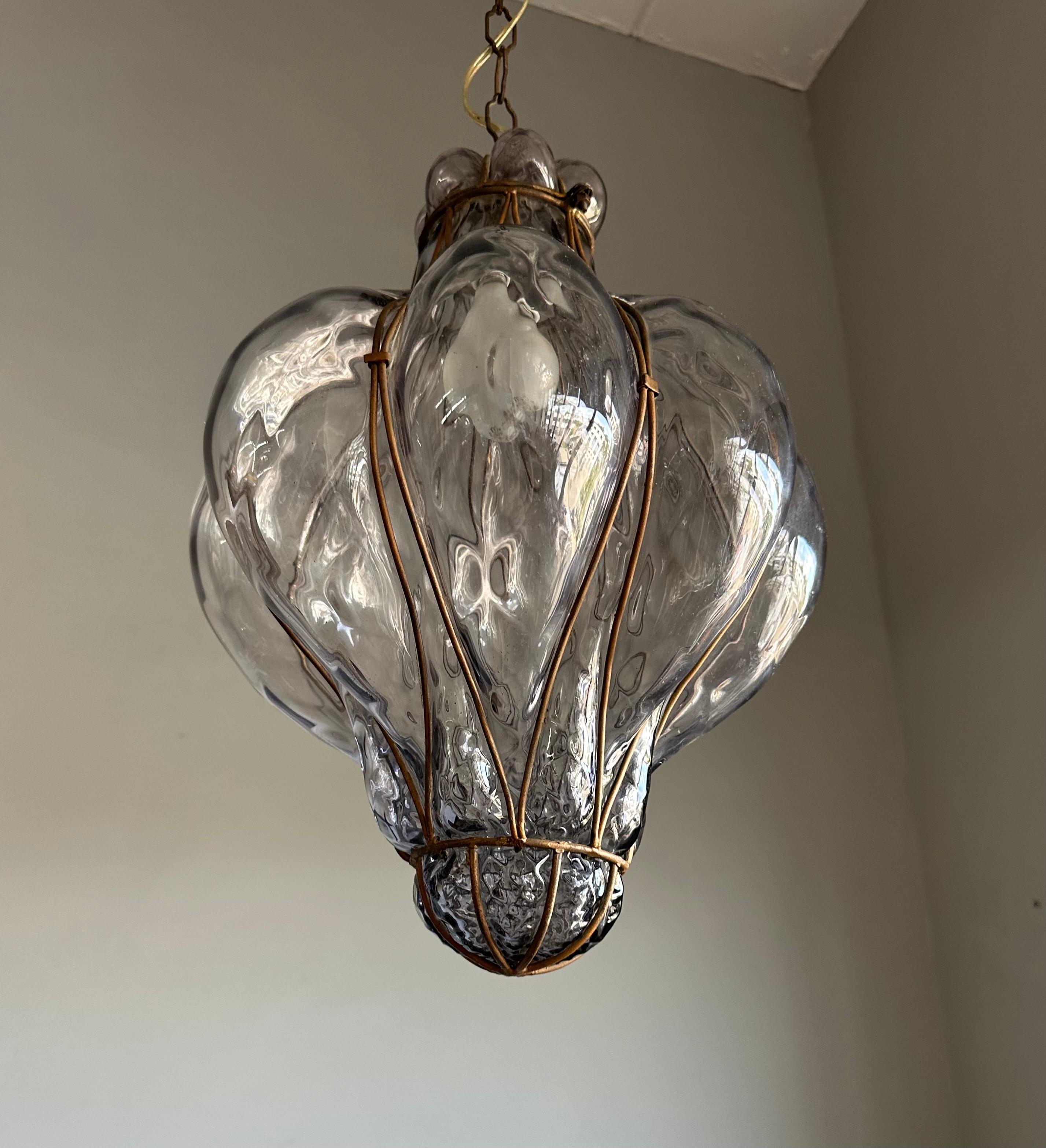 Beautiful color and good size vintage Italian murano fixture with mouthblown glass in painted gilt color thread metal frame. 

If you are looking for a stylish design, near-antique light to grace your home then this handmade specimen from the 1930s