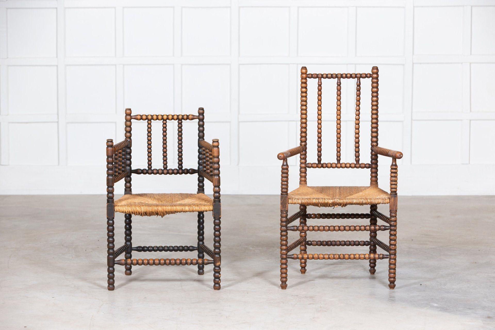 circa 1890
Near Pair 19thC Oak Arts & Crafts Bobbin Armchairs
His & Her William & Mary manner chairs. Each arm chair with bobbin turned oak backs, legs & supports with woven rush seats
sku 1212

Price for the pair
Small W55 x D41 x H88 cm
seat