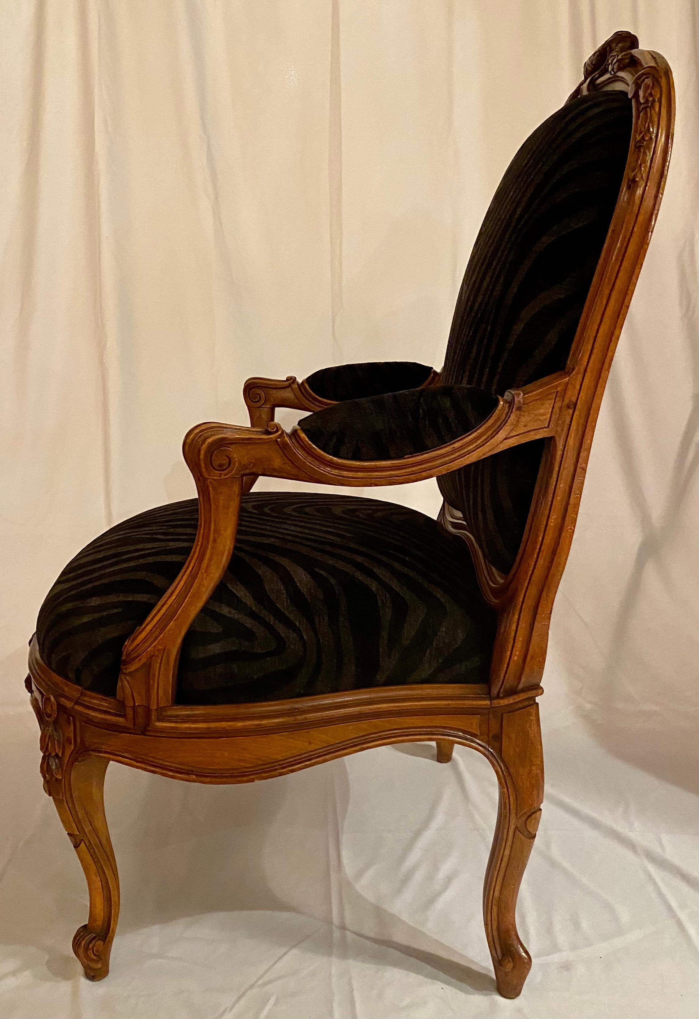 19th Century Near Pair of Antique French Carved Walnut Armchairs, circa 1890