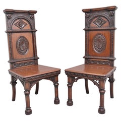 Antique Near Pair of 19th Century Carved Oak Gothic Hall Chairs