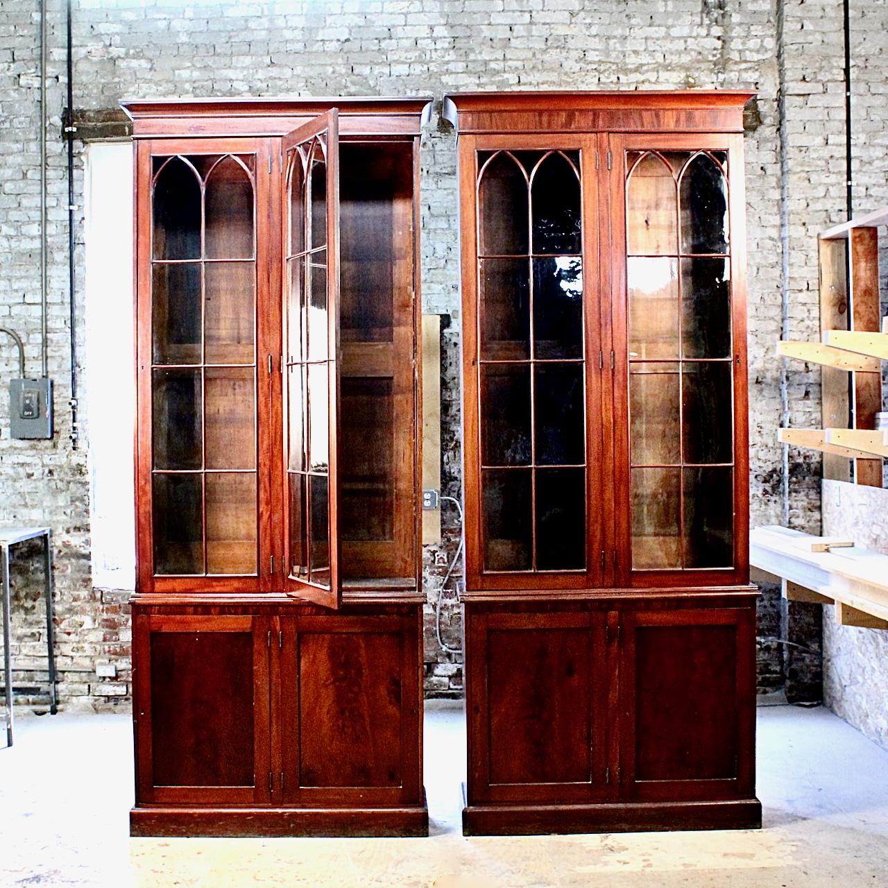 A very fine, very tall near pair of late Georgian (or Neoclassical) style bookcases or cabinets.

By repute, these cabinets were designed for and actively used by the Mütter Museum in Philadelphia, PA. They seem to have been used from the 19th