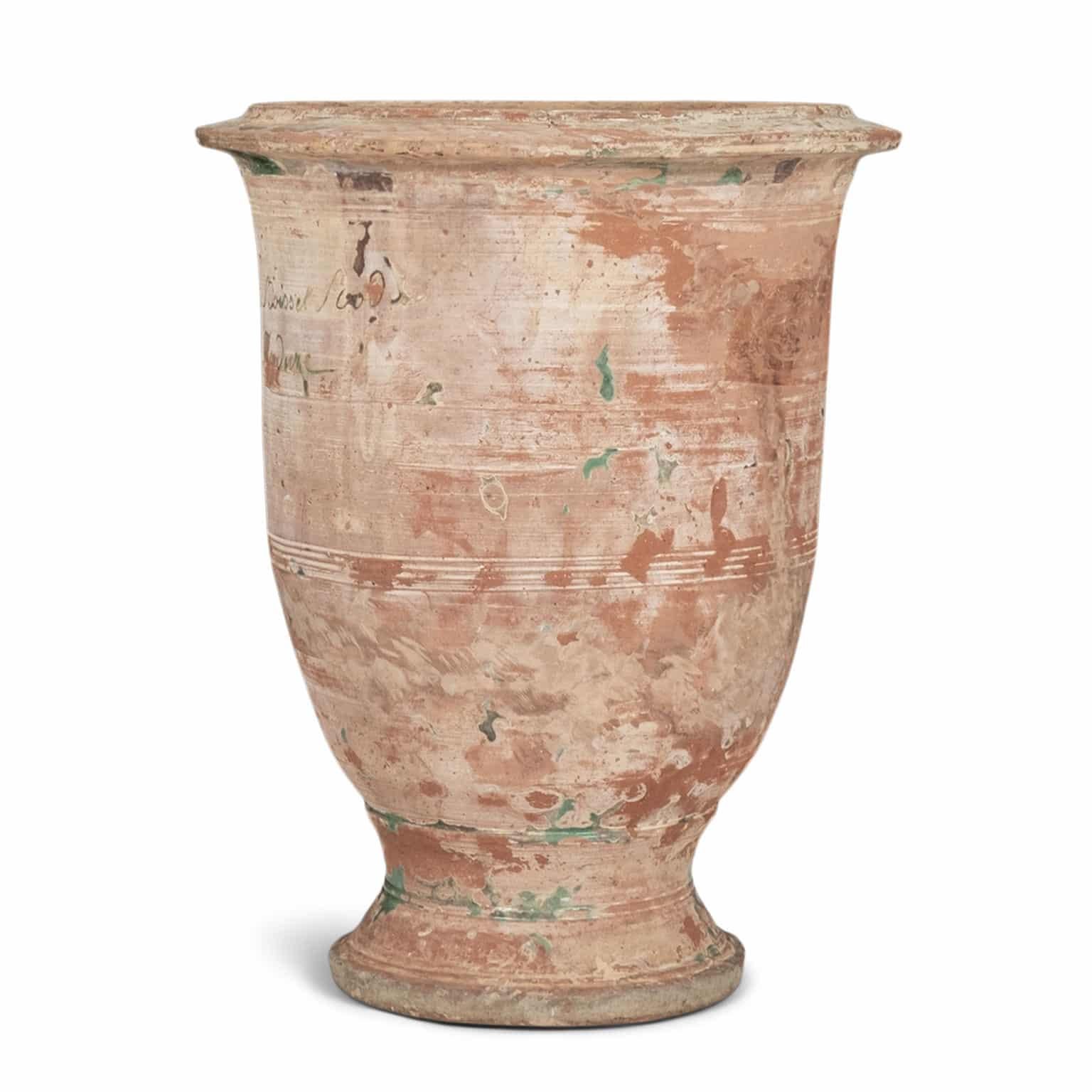 Two 19th century Anduze jars by the Boisset Poterie dating to the 19th century.

One jar is mid-19th century retaining remnants of green glaze. Measures 22.5 inches high x DM 18 inches diameter.

Second jar is circa 1820-1839 and signed “Auguste