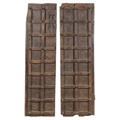 Near Pair of Antique Indian Hand-Carved Architectural Doors