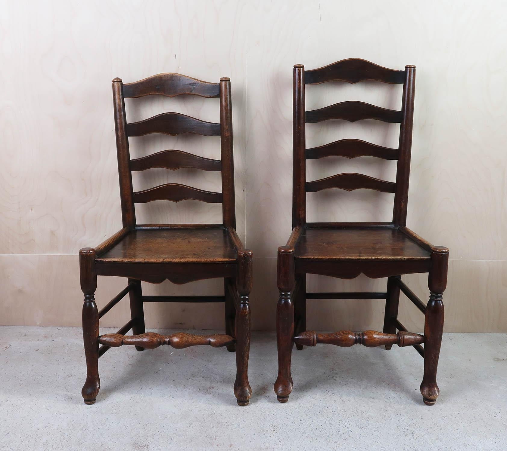 Fabulous near pair of elm ladder back chairs

One is slightly taller than the other

Lovely original patina and colour

Great in a Folk Art interior

Sturdy construction

The measurement relates to the taller of the chairs






