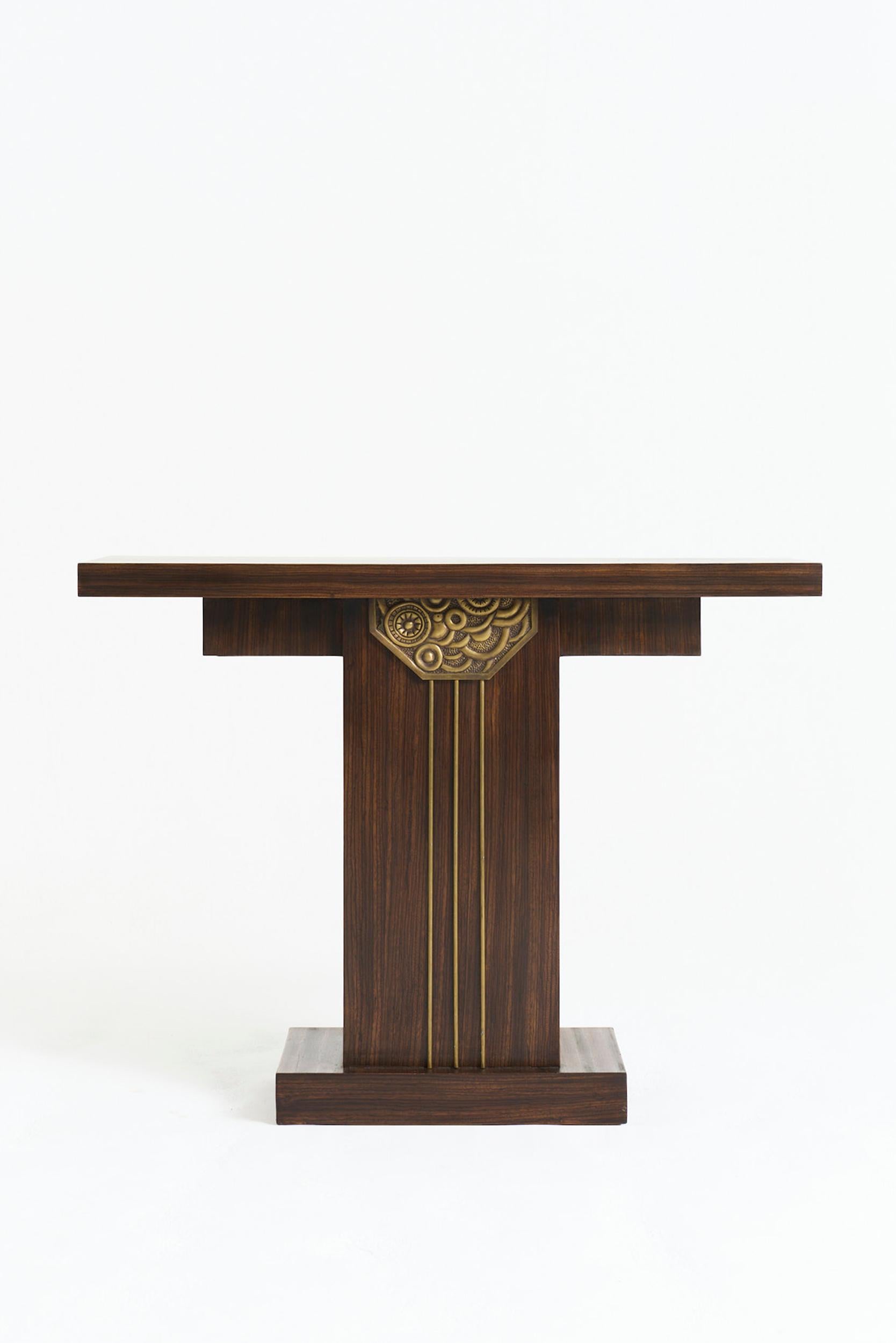A near pair of Art Deco style beech wood and brass console tables
France, mid 20th Century
Console 1: 82.5 cm high by 110.5 cm wide by 38 cm depth
Console 2: 84 cm high by 100.5 cm wide by 38 cm depth