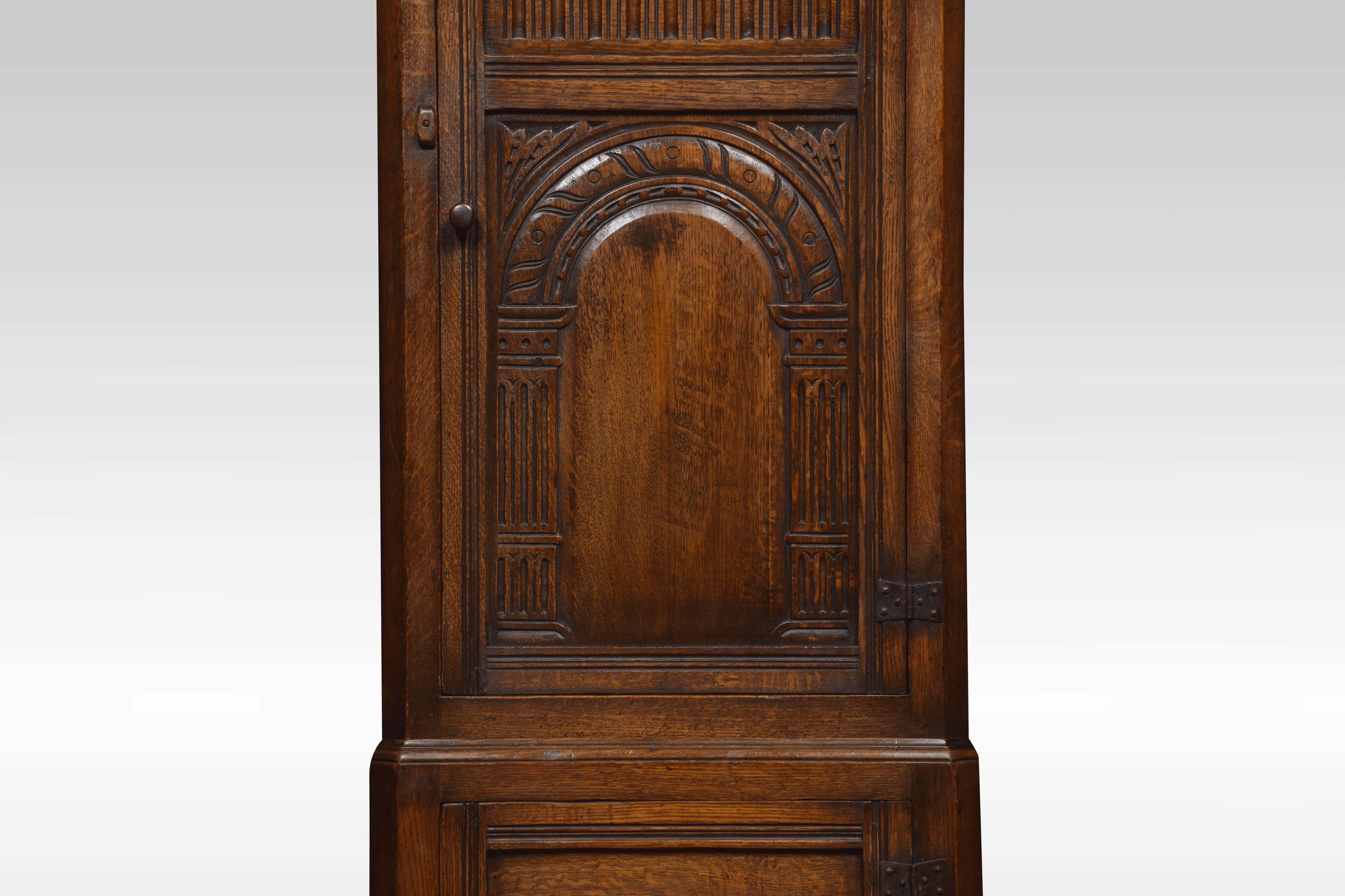 Near pair of oak corner cupboards, the carved frieze above an arched top door with four-panel door below, opening to reveal an arrangement of shelves. All raised up on block feet.
Dimensions:
Height 71.5/70.5 inches
Width 25 inches
Depth 13