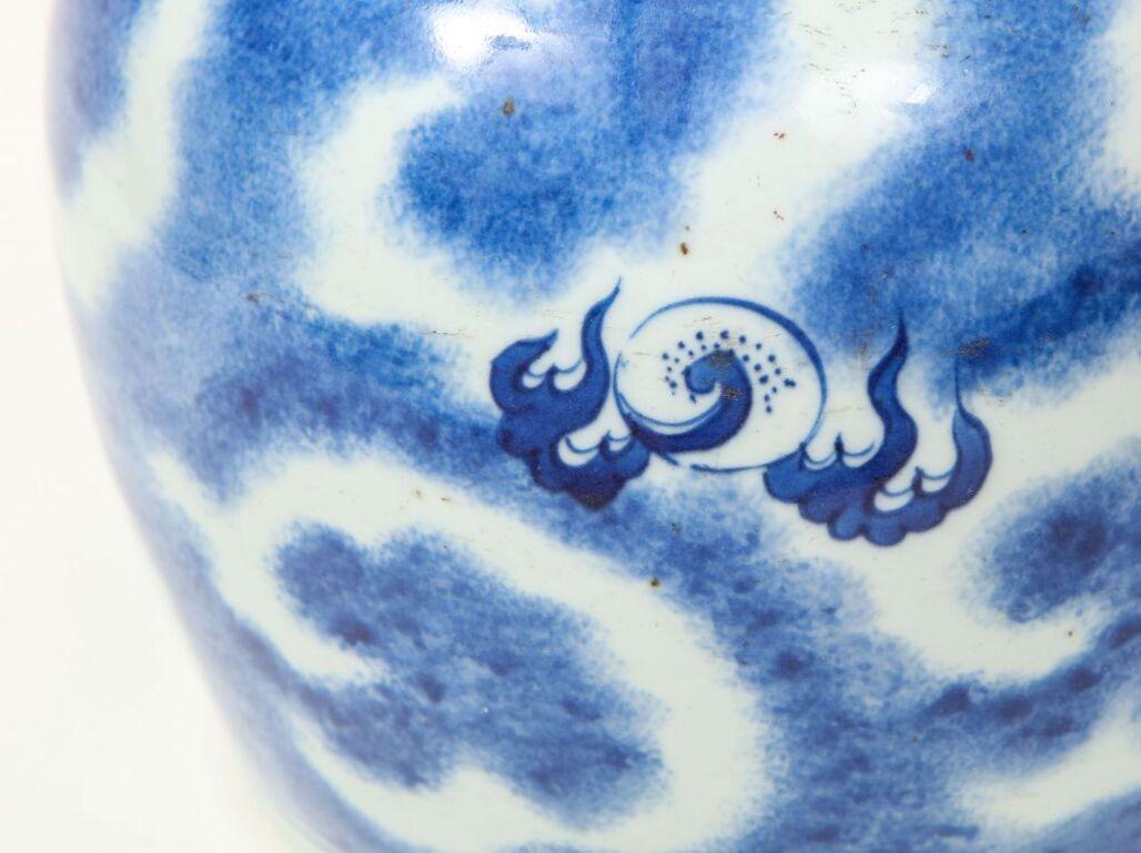 Near Pair of Chinese Blue and White Porcelain Vases Decorated with Dragons For Sale 3