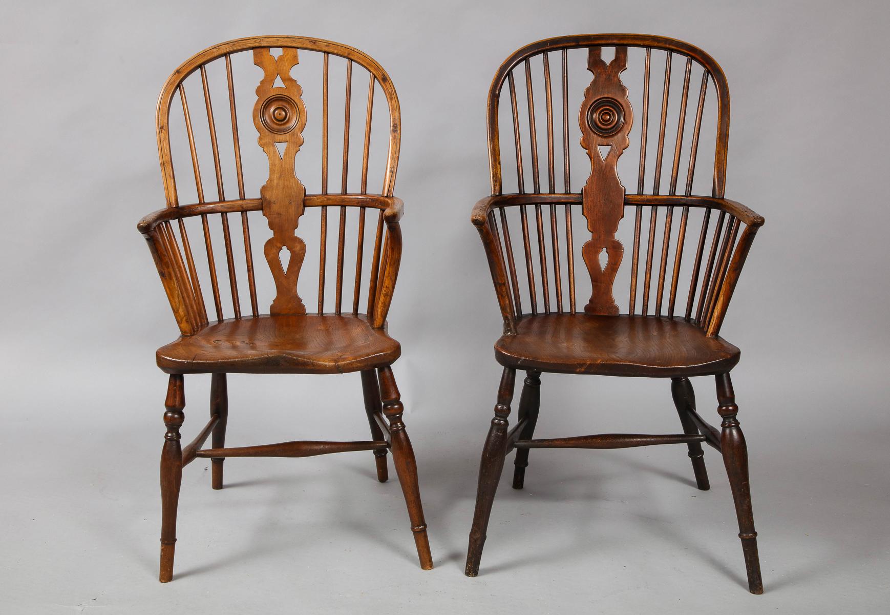 Two English mid-19th century hoop back Windsor chairs with 