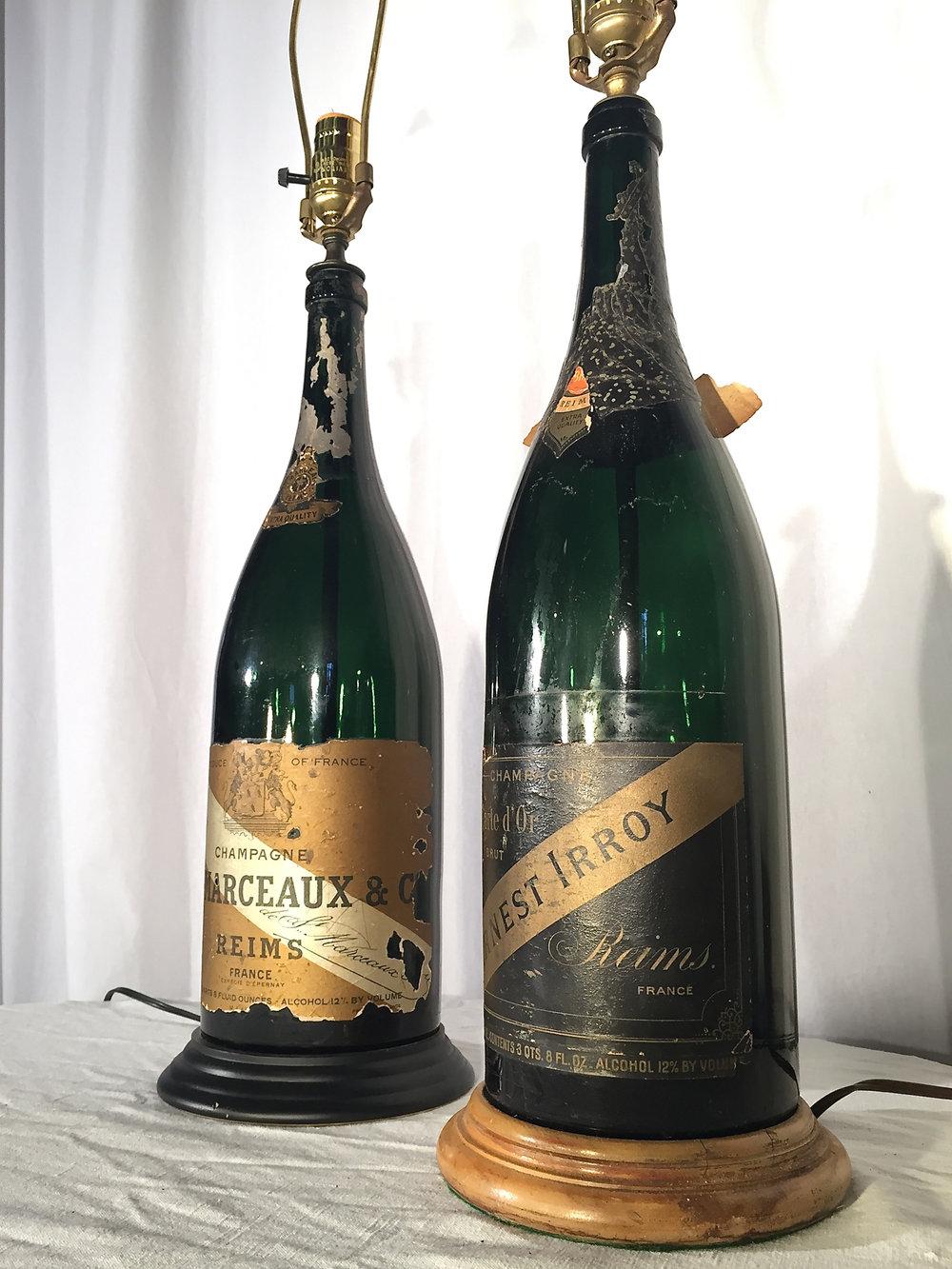 We love these vintage champagne bottles that have been transformed into lamps, even though they are from two different champagne makers (Irrey and St. Marceaux) and sport different bases. Perfect atop a tasting table in your wine cellar or on a