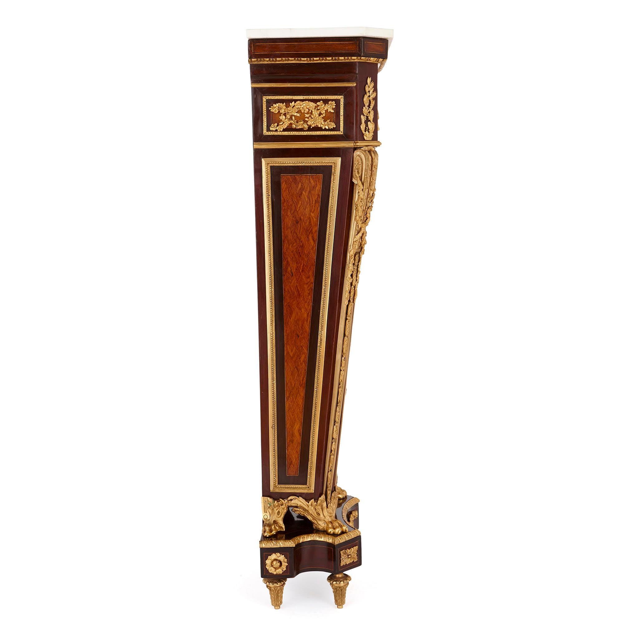 French Near Pair of Gilt Bronze and Marble Mounted Mahogany Pedestals after Riesener For Sale