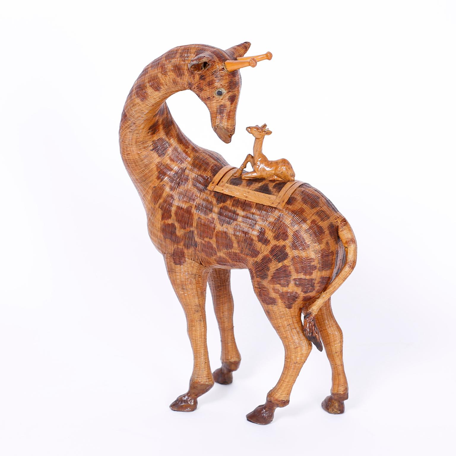 Near pair of wicker giraffes from the famed Shanghai collection with intricate hand woven construction and having carved wood baby giraffe lid handles. 

Measures: From left to right

H 16.5 W 11 D 6.5

H 17 W 10 D 4.5.