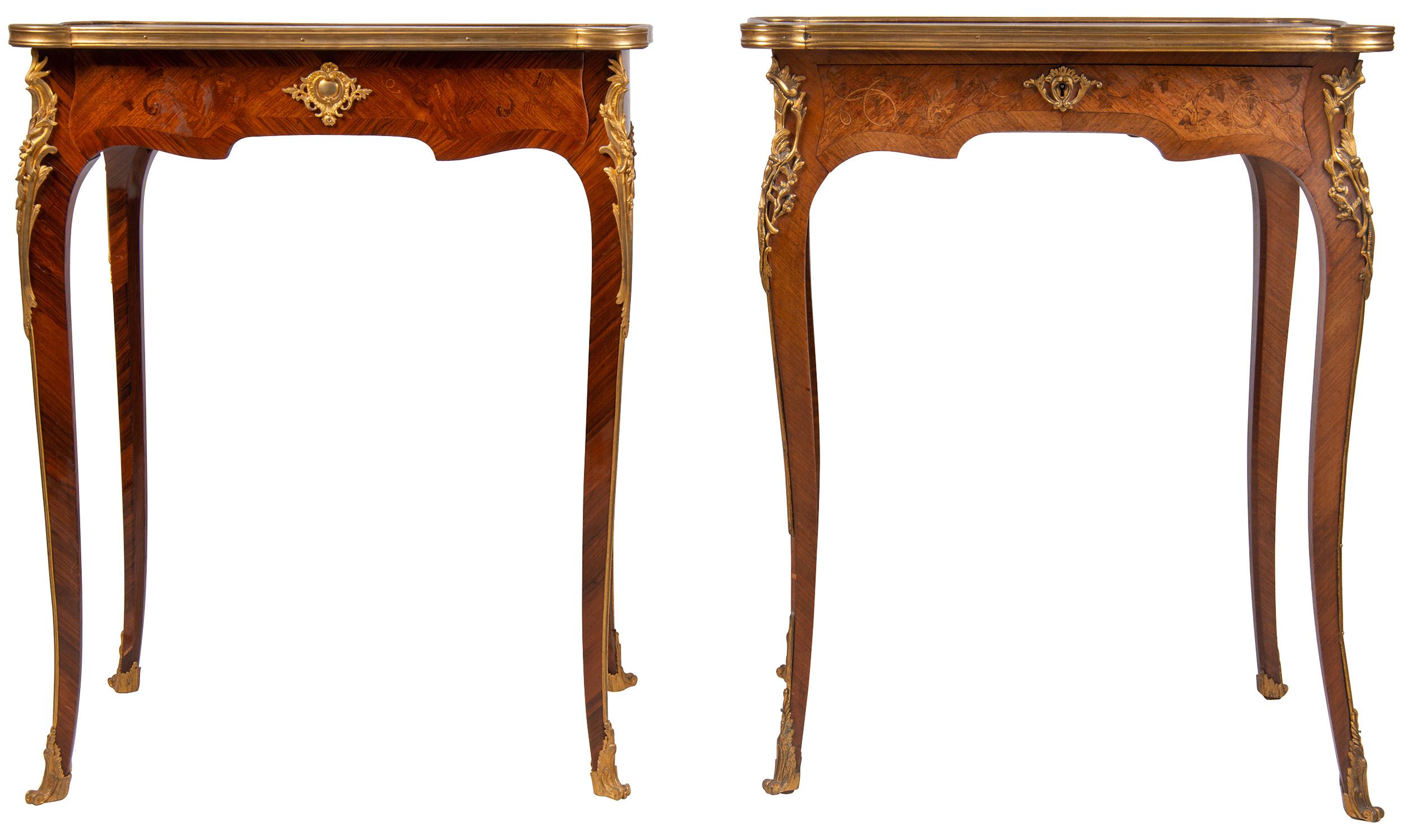 A very good quality near pair of French Louis XVI style side tables, in the manner of Francoise Linke. Each table having fine quality marquetry inlaid scrolling foliate decoration, a single frieze drawer and raised on elegant cabriole legs with