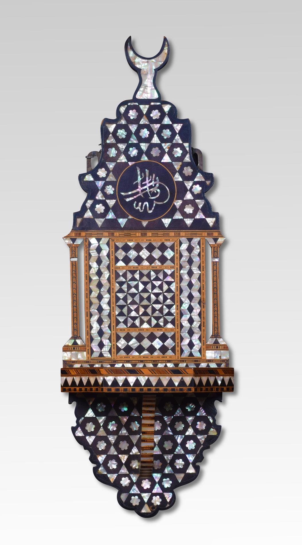 Near pair of Moorish wall brackets expertly crafted with geometric inlays of mother of pearl, bone, and exotic hardwoods.
Dimensions:
Height 24 inches
Width 8.5 inches
Depth 5.5 inches.