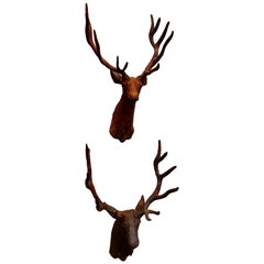 Vintage Near Pair of Outdoor Weathered Cast Iron Wall Hung Stags Heads
