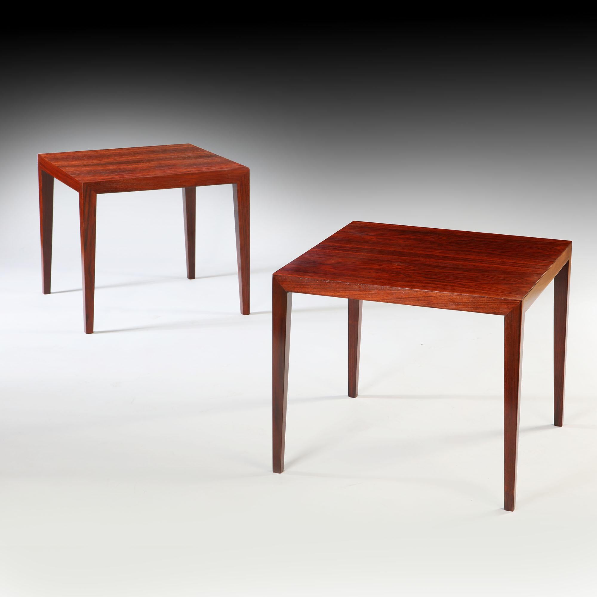 Denmark, circa 1950

A near pair of mid-twentieth century Danish Rosewood square occasional tables with tapering legs, attributed to Severin Hansen.

Table one:

Height       50.00cm
Width        59.00cm
Depth        59.00cm

Table two:

Height     