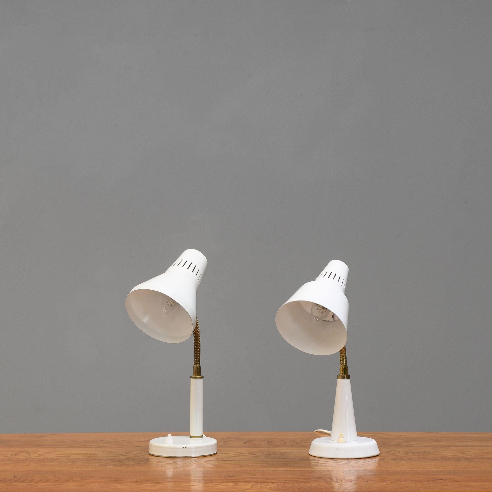 Near pair of goose neck table lamps in original cream finish. Re-wired and tested.
Sweden circa 1960.
H 44cm x W 13cm x D 15cm
Please be in touch for an accurate shipping quote.