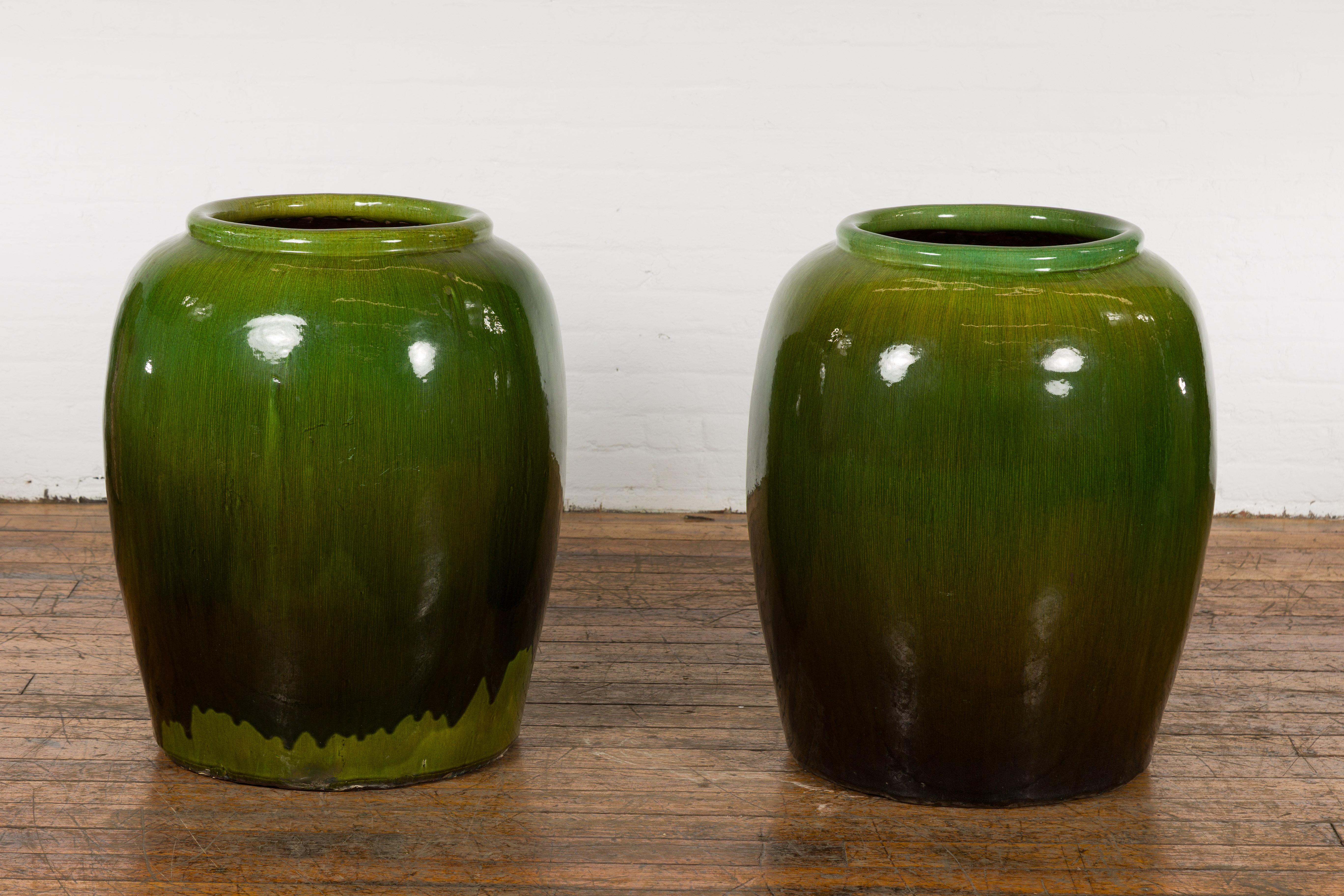 Mid-Century Modern Near Pair of Tall Chinese Vintage Round Green Glazed Ceramic Water Jars