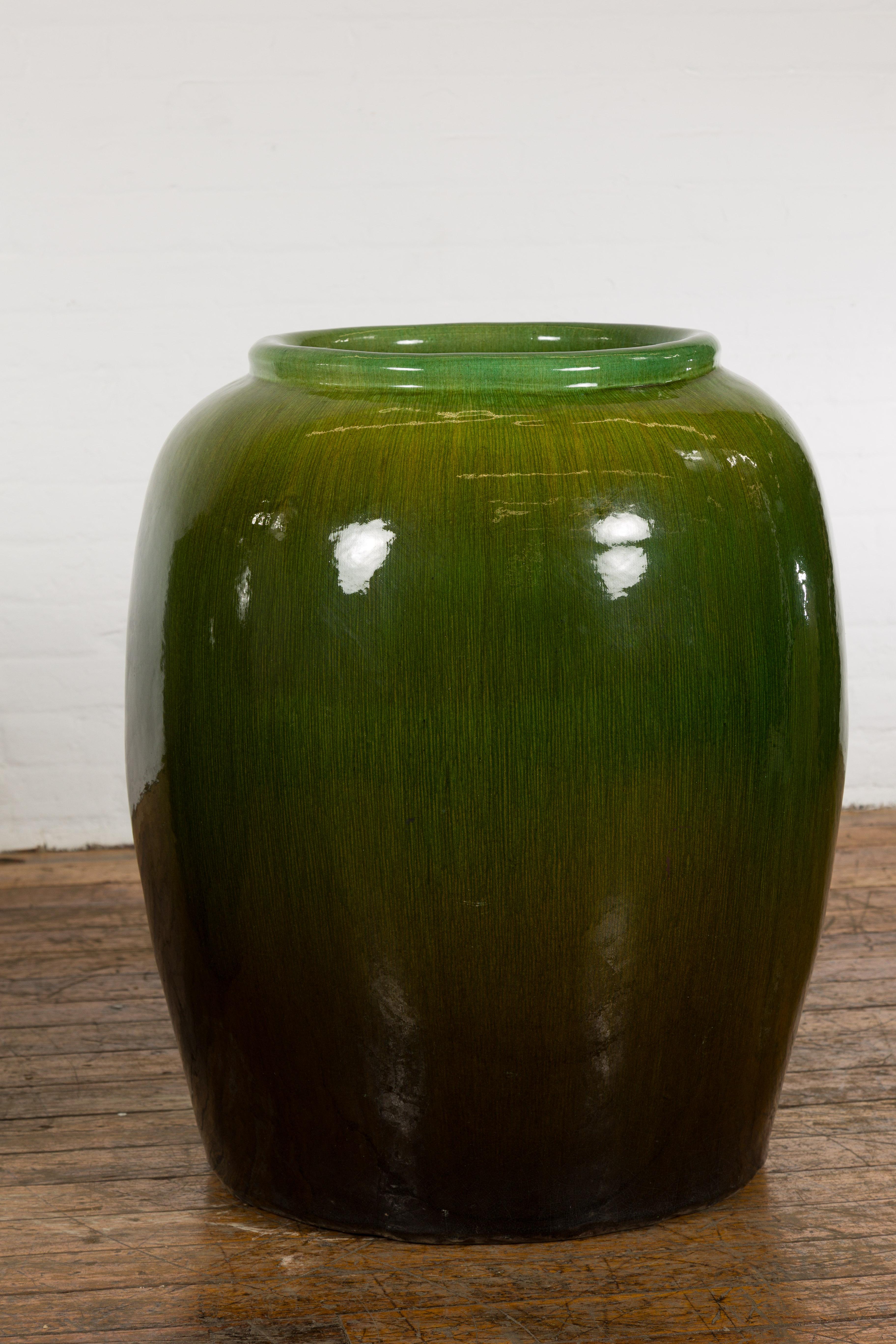 20th Century Near Pair of Tall Chinese Vintage Round Green Glazed Ceramic Water Jars