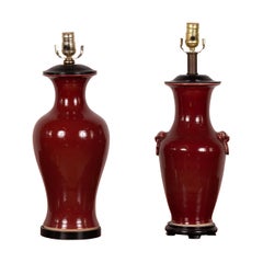 Near Pair of Vintage Chinese Sang de Boeuf Table Lamps with Round Black Bases