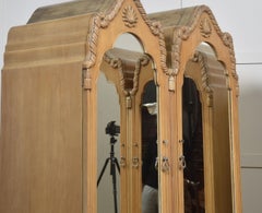 Near pair of walnut wardrobes